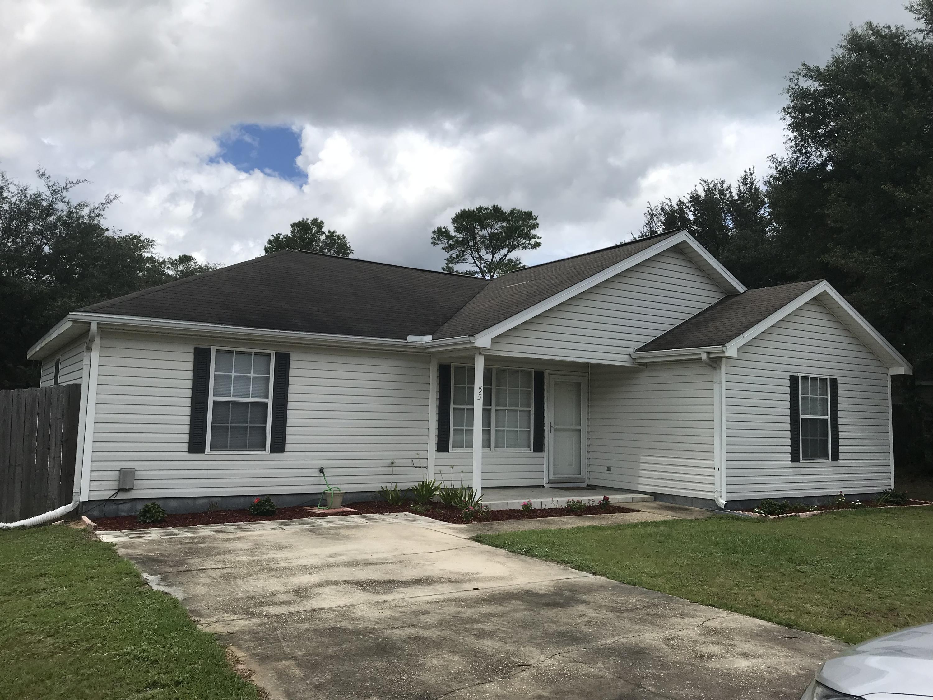 This charming 1472 SF 3 bedroom, 2 bath home sits on a 1/2 acre lot just off of Hwy 90 and just a couple miles from the Hwy 285/90 intersection. This home features a spacious living area and a split bedroom plan. The master suite is to the left of the living room and the other bedrooms and bath are to the right. It was originally built as a 4 bedroom but previous owners removed the closet and opened the wall onto the kitchen and serves as a formal dining area. The kitchen has stainless appliances and plenty of cabinets. The large laundry area is just off the kitchen. The huge backyard is fabulous with a pergola as you exit the home and paver patio. Towards the back of the lot is your your own horseshoe area, a fire pit, and an precious covered bench area.....ideal for entertaining or enjoy Towards the back of the lot is your your own horseshoe area, a fire pit, and an precious covered bench area.....ideal for entertaining or enjoying large family gatherings. Oh and let's not forget the awesome storage building that has loads of room!!! Sorry...no pets. Call us today!