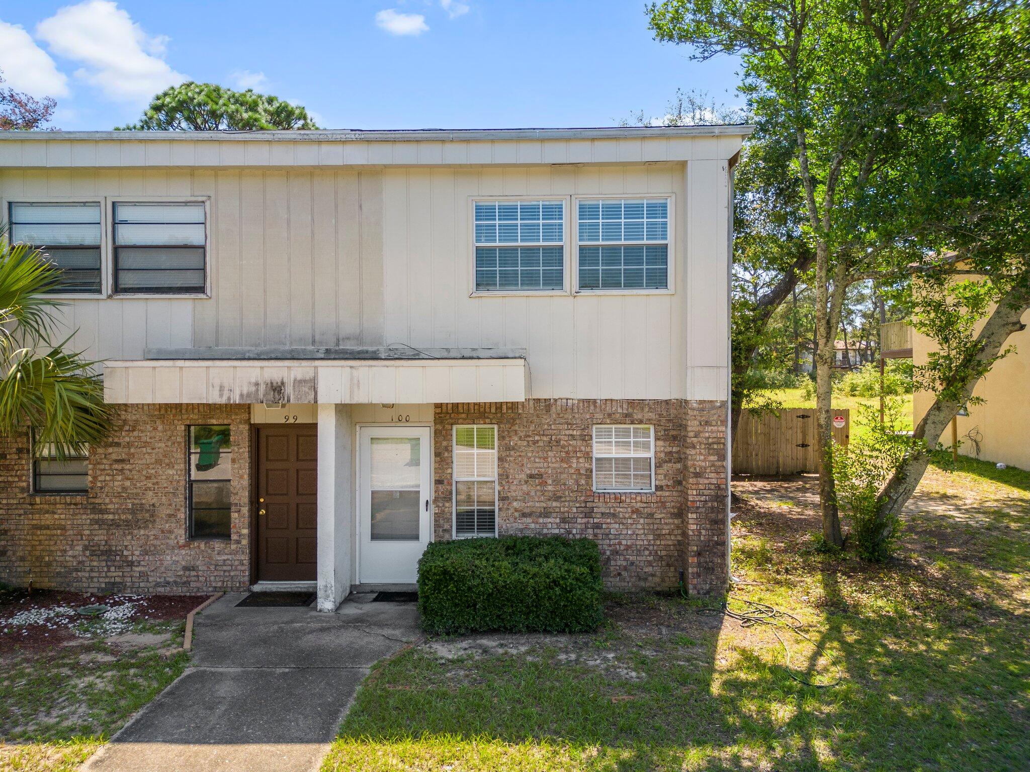 Conveniently located in Shalimar, this end unit, two bedroom, two bath townhome is ready for move-in. Easy care tile flooring downstairs in the kitchen, great room and bath. There's also a screened in porch overlooking the backyard. Upstairs are two bedrooms plus a 6 x 8.5 foot bonus room. The master bedroom has double closets and there's an additional storage room off the screened porch. Call for your showing today! No smoking, no pets and no vaping.