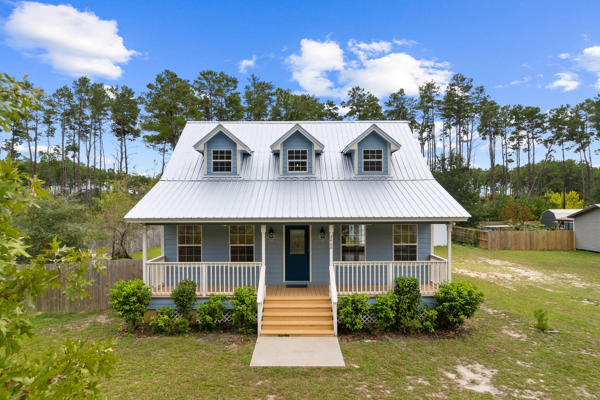 Welcome to this charming fully remodeled cottage situated on a spacious 1/2 acre lot. This property offers a multitude of possibilities, including an oversized detached garage (1000 sq feet) that is perfect for car enthusiasts or those seeking ample space for their hobbies or a work/live space. 

Step inside from the oversize front and rear porches and be greeted by the exquisite craftsmanship evident throughout. The house has undergone a complete renovation, with attention to detail evident in every corner. The stunning hardwood floors have been meticulously sanded (Australian style) and restained, adding a touch of elegance to the living spaces throughout entire home. 

Fresh interior paint breathes new life into the home, creating a bright and welcoming atmosphere. The updated kitchen boasts modern appliances, sleek countertops, and ample storage space.

The master bath has also been thoughtfully redesigned, providing a tranquil retreat with its contemporary fixtures,dual sinks, waterfall shower and finishes. 

To top it all off, new lighting fixtures have been installed throughout the property, enhancing its charm and functionality. 

The standout feature of this property is the oversized detached garage. With its generous size, it offers endless possibilities for car aficionados needing extra storage or individuals with hobbies that require ample room to spread out and create or even someone searching for space to work a trade from home.  Property also has a potting shed for the greenthumb in the  family. 

Imagine having the freedom to pursue your passions without compromising on space. The garage is a blank canvas, waiting for you to transform it into your personal sanctuary.

Nestled on a spacious 1/2 acre lot, this fully remodeled cottage presents an exceptional opportunity to own a home that seamlessly blends modern updates with timeless charm. Don't miss out on this unique offering - schedule your private showing today!