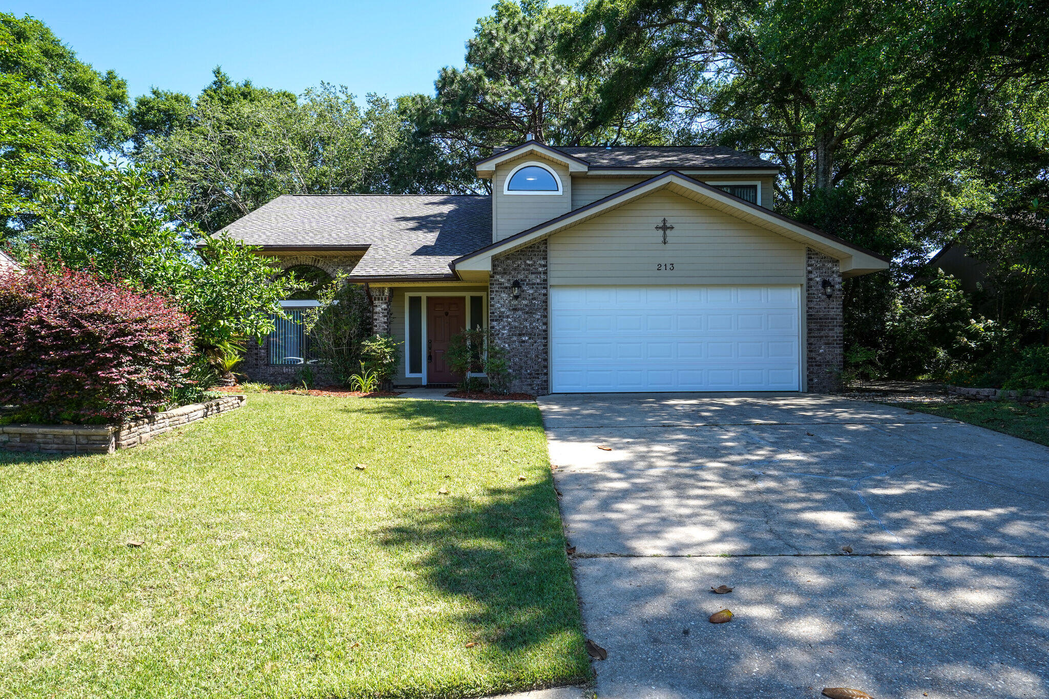 Welcome to your dream rental in the highly sought-after Rockywood neighborhood! This spacious 4-bedroom, 2.5-bathroom home offers the perfect blend of comfort, charm, and convenience. Tucked away in a quiet, friendly community yet just minutes from shopping, dining, and top-rated schools, the location can't be beat.

Step inside to be greeted by cathedral ceilings and gorgeous real wood flooring dappled with soft, natural light. A separate family room features a stunning wood-burning fireplace that stretches to the vaulted second-story ceiling, creating a warm and inviting atmosphere.

The kitchen is outfitted with quality appliances, designer fixtures, and a charming deep shadowbox windowsill, perfect for your favorite herbs or décor. The kitchen island with granite top doubles as a breakfast bar and offers extra room for meal preparation or to lay out snacks!

The first-floor primary suite includes an ensuite bathroom with a double vanity, offering privacy and comfort. Upstairs, you'll find three additional bedrooms and a full bath.

Enjoy Florida living year-round on the screened, tiled back porch, or unwind in the beautifully landscaped backyard featuring arbors and deckinga cozy outdoor oasis.

Additional features include a 2-car garage and plenty of storage throughout. Call Today! Call 850-729-0399

View rental requirements or apply online at www.RentwithBSR.com

No smoking or vaping.

A small dog may be allowed with some restrictions and a $400 non-refundable pet fee.

FEES: $50 per adult 18+ application fee, Landlord Liability Policy (if proof of Renter's coverage is not provided) $15 mo, Pest Assurance pest control policy $20 mo.