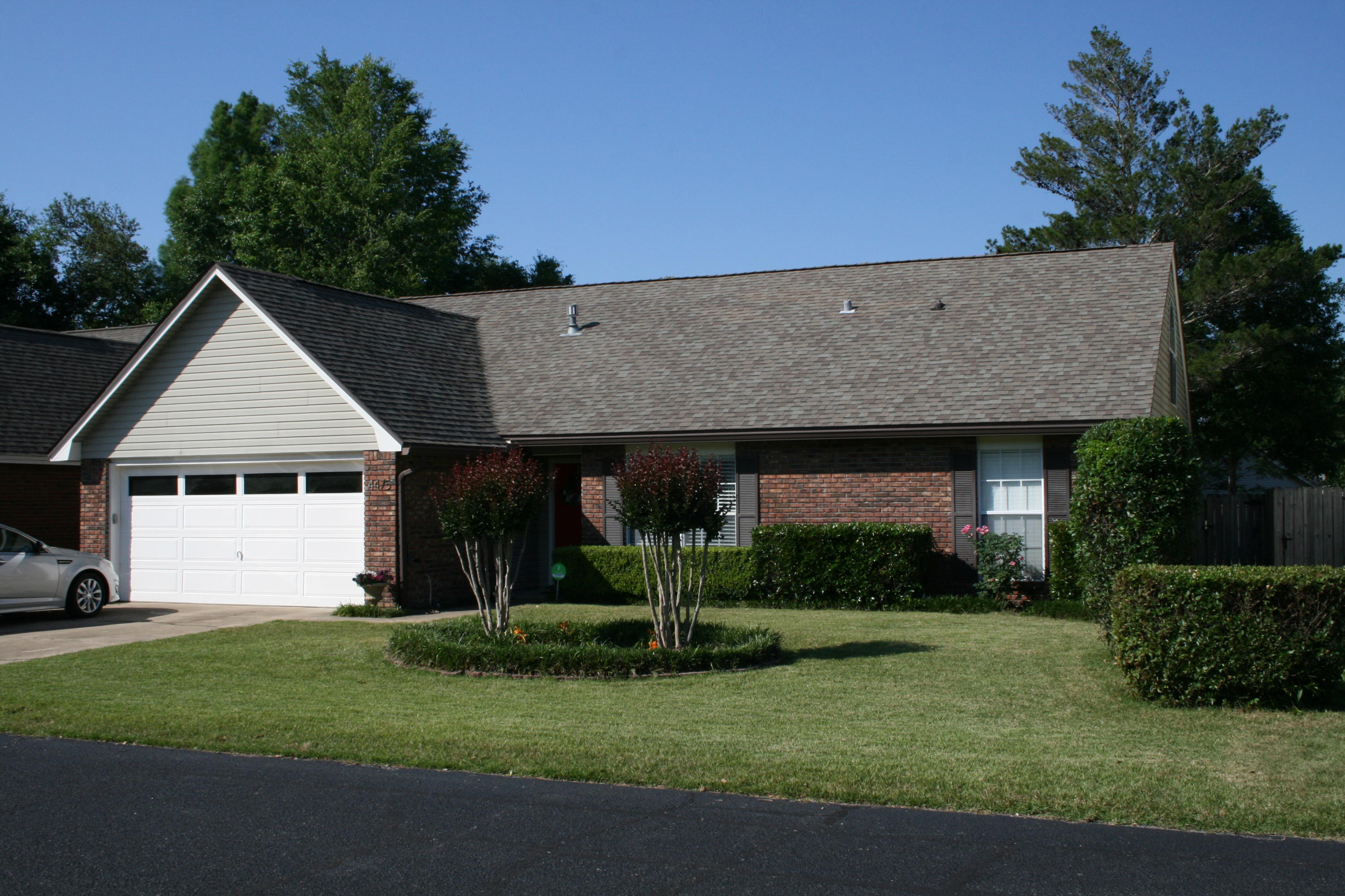 This beautiful home in the Bluewater Bay neighborhood of Parkwood Square is waiting for you. This updated home with a great backyard is perfect for any sized family, large or small. Close to schools, restaurants and shopping this is the perfect Bluewater Bay location. Upon entering this home you immediately notice the beautiful hardwood floors throughout the downstairs living areas. The large living room featuring high ceiling is accented by a fireplace surrounded by granite tile. Just off the living room is the updated kitchen. You will love the abundance of custom cabinets and plenty of granite counter space as well. The owner will consider a dog (No Cats) with restrictions and a non refundable pet fee and a refundable pet deposit. NO Smoking! Owner provides lawn and pest service