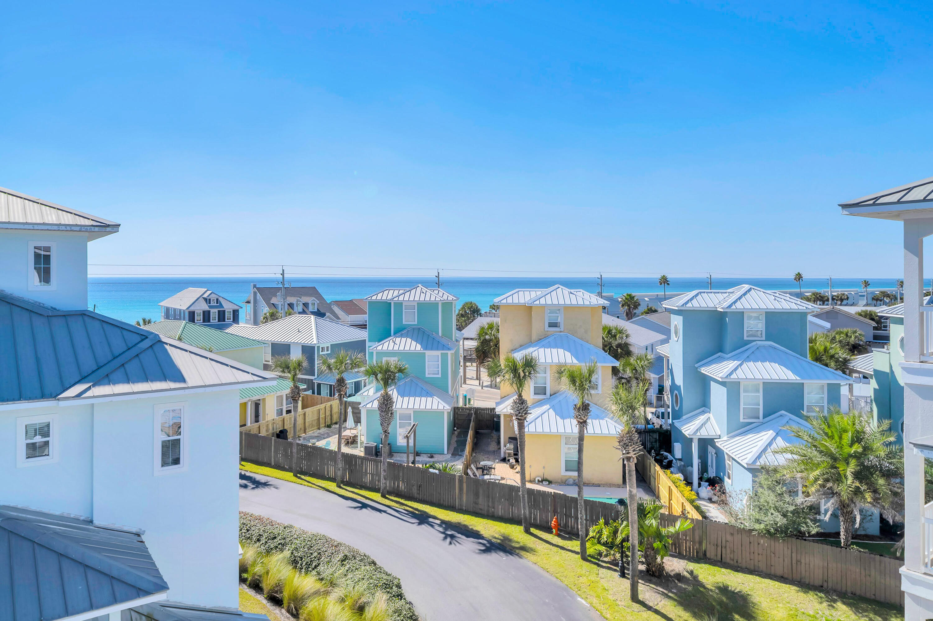 West End RENTAL MACHINE with Private Elevator & Gulf Views - 30A Luxury Without the Hassle! Experience the appeal of 30A proximity without the premium price tag or restrictive beach access issues. Positioned in the private, gated PCB community of Casa Del Mar, this property sits directly across from two public beach access points, offering easy access to the white sand and emerald waters. The location is a major draw, delivering a low-density atmosphere just minutes from Publix, multiple dining options, and the upscale venues of 30Avenue. This 4-story residence is designed for maximum occupancy and comfort. It features a convenient elevator and a spacious layout with 3 bedrooms plus a large loft, easily sleeping 9 guests. Meticulously maintained and upgraded, the home features a brand-new roof (in process), new exterior waterproofing/paint, fresh interior paint, new bathroom vanities, and upgraded flooring. It conveys fully furnished with high-end coastal decor. A new buyer can start generating revenue right away. Rental history grossed over $77K in 2025. With reasonable HOAs at $2257/quarterly, a community pool, and a spacious two-car garage, this townhome is an exceptional income-generating opportunity that checks every box for the savvy buyer. Additionally, there are no pending special assessments. Located less than 30 minutes from Northwest Florida Beaches International Airport, this is the turnkey asset you have been waiting for. Schedule your showing today. A video tour is also available.