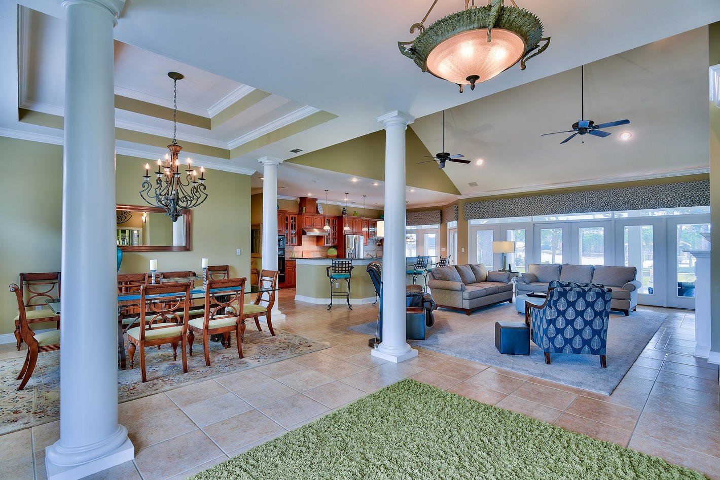 INCREDIBLE VALUE for this waterfront estate with deep water! Looking for the perfect waterfront home that offers the serenity and peace you have been searching for, yet a prime entertainment home with huge open spaces to enjoy with your family & friends? This is your match. Phenomenal 4-bedroom custom brick home nestled on Honeymoon Cove in the exclusive gated community of Grand Cove within Driftwood Estates. This 4,680 sq. ft. home (3,202 h&c) was built in 2002 and is in immaculate condition with ~75 ft. on the water. The pride of ownership is apparent the moment you step on the grounds. Recent updates include fresh paint throughout, two brand new AC units, new stainless steel GE fridge (Nov. 2014), resurfaced pool, and new upstairs patio flooring. Interior boasts beautiful cathedral ceilings in the living area, thick crown molding, multi-level trayed ceilings and 18" tile floor throughout the entire ground floor. The home is very spacious with a spectacular open floor plan and huge outdoor space with a 64 x 12 ft. covered & tiled lanai along with a screened-in pool lending views of the cove. The kitchen is very open and great for entertaining with a ~12 ft. granite breakfast bar and plenty of countertop space, including an island. The cabinets are custom wood with a beautiful decorative finish, there is a tiled backsplash, gas range, and even a wet bar. Plenty of natural light comes in from the wall of glass windows & doors and you can dine in the breakfast knook, bar, or formal dining area. The living area is cozy with a gas fireplace, alcoves, and direct access to the lanai, a true extension of the home's living space. This estate is built on nearly a Â½ Acre lot surrounded by lush landscaping, walkways, and mature trees, including Ruby Red Grapefruit and Meyer Lemon. 

Take a stroll down to the private dock directly on Honeymoon Cove with new covered boat lift, 2 Jet Ski lifts, and deep water (apx. 10 ft). The fishing is great right off the dock and seeing dolphins swim by is a frequent occurrence. The cove is very peaceful and a perfect place to paddle board, kayak and boat. The cove is protected from south and north winds on the peninsula and there is easy access to Choctawhatchee Bay that connects to the Gulf of Mexico. 

One of the most unique features of this home is the fact that all 3 main bedrooms are located on the ground floor. The waterfront master suite has direct access to the lanai, dramatic trayed ceilings, a large walk-in closet, and a beautiful on-suite bathroom with Jacuzzi tub, double vanity, and tiled walk-in shower. The two guest bedrooms are located on the opposite side of the home for privacy, one with an on-suite bathroom that can also be used as a pool bath with access to the screened-in pool. The additional guest bedroom has a bathroom with a tub. The upper level is an entire guest quarters with an office, bathroom, and private balcony overlooking the pool and cove. There is plenty of storage throughout the home, a 3-car garage, and deluxe laundry room with full size w/d, sink, and drying closet. 

Enjoy coastal living at its finest in this exclusive gated community that is private yet centrally located to everything you need. Sacred Heart Hospital, fire & police stations, great schools, and Grand Boulevard Town Center are just down the street offering shopping, dining, a movie theatre, and entertainment. The location is great during our busier summer months because you can access Grand Boulevard without even having to drive onto Highway 98 -convenience without the traffic! Baytowne Wharf & Marina and the sugar white sand beaches of the Gulf of Mexico are also nearby. Do not miss out on this opportunity to own an extraordinary waterfront home within Grand Cove. The HOA fees are low and there are new security cameras installed at the Grand Cove gated entrance for this private community.