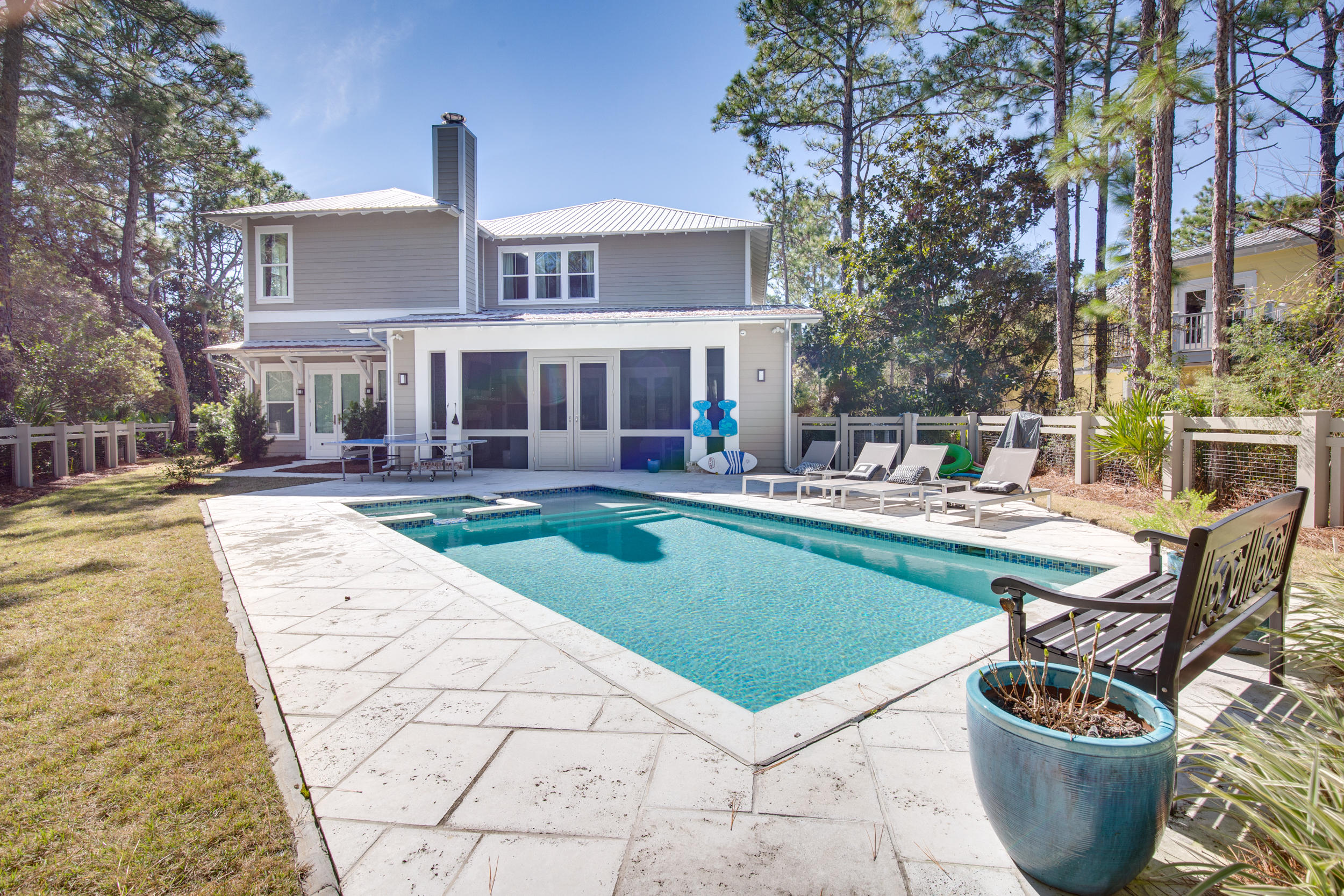 This spectacular custom home was built by Samuel Taylor Homes and is the builders personal home, so no details were left out.  The home has a large living area with open floor plan with the gourmet kitchen opening up to the dining and living area.  Off of the main living area is a large screened in porch with with a wood burning fireplace, TV and a built in gas grill with sink and beer Tap, making this the ultimate entertaining area.  This porch opens up to an expansive fenced in back yard with large pool and hot tub.

The kitchen has Wolf Stove, convection microwave, wine cooler, ice maker and walk in pantry.

There are two bedrooms on the first floor  including the master with an expansive closet and beautiful shower and tub wet room.

Upstairs you have 3 bdrms and a large bunk area. room.  

You also have two laundry rooms one up and one down and a 3 car garage.

This home is a must see and is perfect for a full time resident, or a true second home.