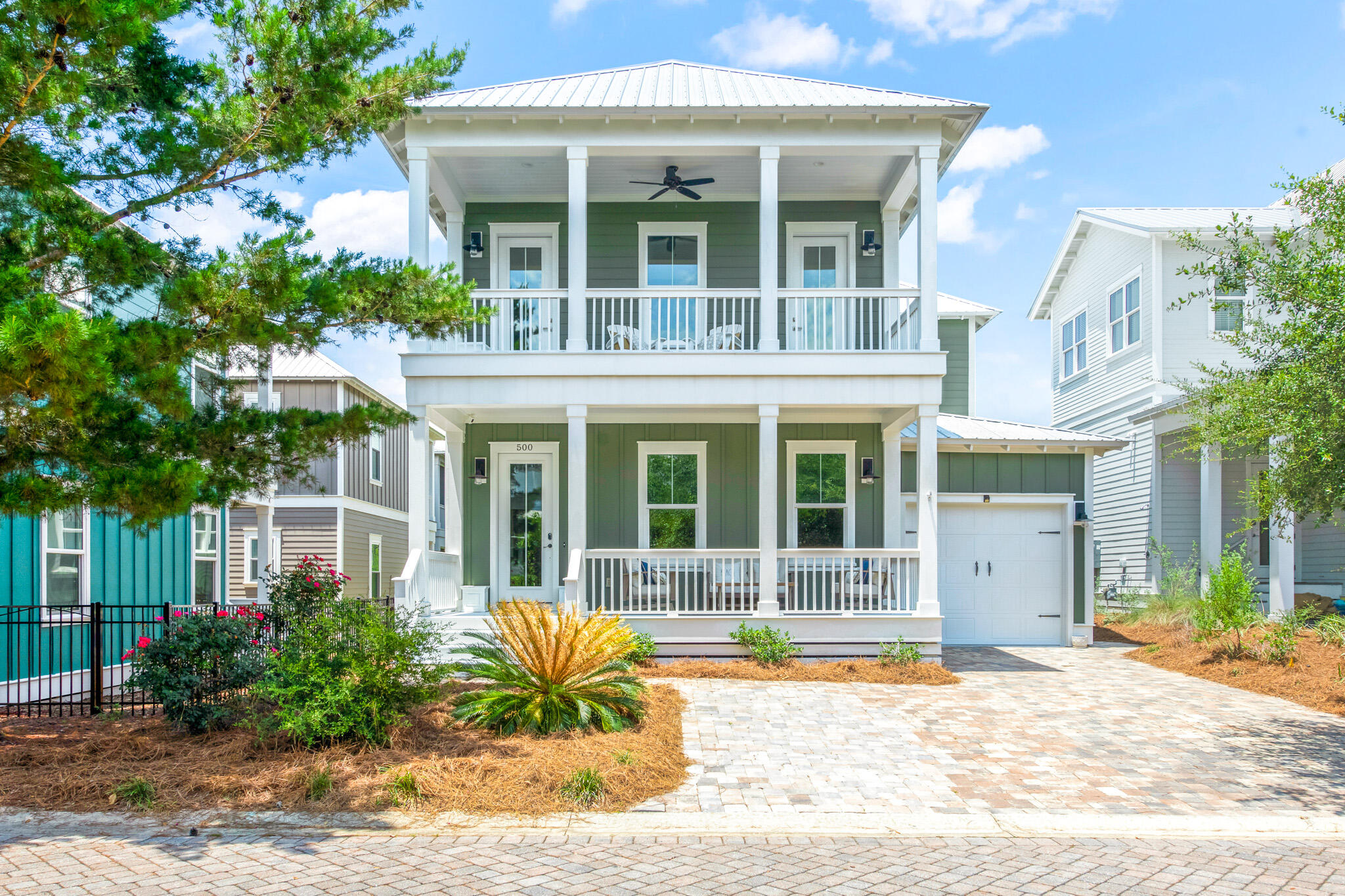 Escape to coastal bliss in this meticulously maintained and beautifully appointed beach house built by Coastal Custom Homes. The open floor plan, large living area, and tall ceilings create an inviting and spacious atmosphere. Every bedroom has access to a porch, providing a serene space for relaxing. The back of the home enjoys views of the nearby pond. Two luxurious primary suites, one on each level, offer privacy and comfort, while an additional living area upstairs adds versatility. The open first floor seamlessly blends elegance and functionality, accommodating a formal dining area and a well-appointed living/TV space. Community amenities include a swimming pool, hot tub, fire pit, and more. Nearby access to the famous 30A Beaches ensures easy enjoyment of the white sandy shores.