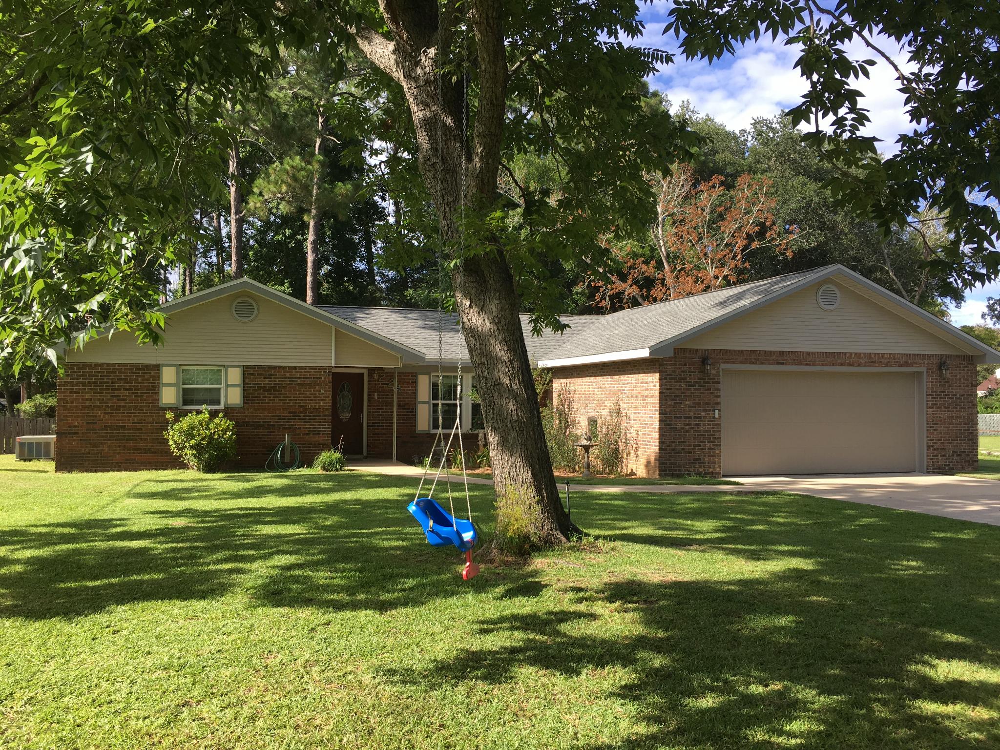 THIS IS SAME AS MLS 757996 BUT DOES NOT INCLUDE BACK LOT. SEE PHOTOS FOR CLARIFICATION . Beautiful Brick Home, Move-in Ready. Great open Floor plan from Living Room to Kitchen and flows into Heated and Cooled Florida Room. The Master Bedroom has Tray Ceilings and lots of space, and features a connected master bathroom. 3 additional bedrooms on the opposite side of the house ensure peace and quiet for the master suite. This home has 4 total Bedrooms and 3 FULL Bathrooms. A beautiful dark wood kitchen GRANITE counter tops with complementing glass tile back splash and stainless appliances including a natural GAS cooktop/oven. absolute must see property. the Yard is great for kids or enjoying the beautiful florida outdoors Buyer to verify all info and dimensions.