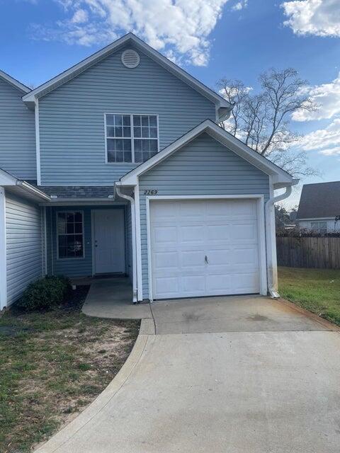 Spacious two bedroom townhouse with garage at end of cul-de-sac and just off Racetrack Road. Has living/dining combination with extended breakfast bar. Half bath downstairs with each bedroom having it's own private bath. Yard service included. With an approved pet application, owner will allow up to two pets fully grown(50lbs or less) with a $350 non-refundable pet fee for each pet. All Coastal Realty Services residents are enrolled in the Resident Benefits Package (RBP) which includes renters insurance, HVAC air filter delivery (for applicable properties) and our best-in-class resident rewards program, and much more! More details upon application.