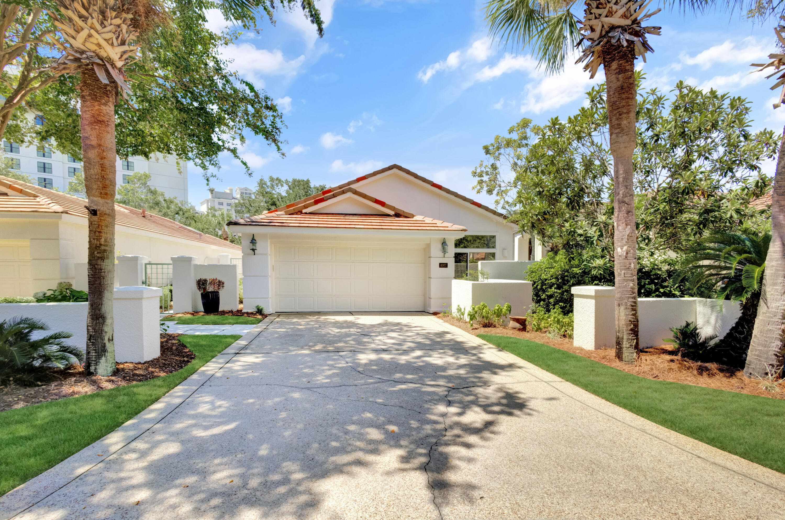 Welcome to 8002 Legend Creek Drive—a haven of elegance within Sandestin Golf and Beach Resort's coveted Legend Creek neighborhood. This single-level retreat, located on a tranquil cul-de-sac, offers privacy and charm. Step into a newly painted interior with travertine tile floors, basking in natural light. Gather around the gas fireplace, or unwind on the newly screened-in porch, while enjoying views. With a 2022 AC and recent updates, including new outdoor gates and new window treatments, this home harmonizes comfort and style. Ideally located a short distance to Hotel Effie and The Village of Baytowne Wharf, it's an invitation to experience the renowned Sandestin lifestyle. Seller has a LOMA letter taking home out of flood zone. As an introduction to the Sandestin lifestyle, we invite our new owners to explore amenities that make Sandestin special. The listing brokerage and seller(s) are presenting the buyer(s) of this property with (2) 90-minute rounds of Tennis court time, a golf foursome at one of our three championship courses, and a round of golf for up to four (4) players at the unrivaled Burnt Pine Golf Club.

Sandestin Golf and Beach Resort features more than seven miles of beaches and pristine bay front, four championship golf courses, 15 world-class tennis courts, a 226-slip marina, a fitness center, spa and celebrity chef dining. Shop, dine and play at the charming pedestrian village, The Village of Baytowne Wharf and more. Inside the gates of the resort, residents enjoy a balanced lifestyle of high-class living, spanning the 2,400 acres from the beach to the bay. Everything within the gates of the resort is accessible by golf cart or bicycle. The entire resort is interconnected by miles of pedestrian, bike and golf cart paths that weave through groves of live oaks, meandering past natural lagoons, fountains, man-made lakes, and meticulously landscaped fairways.