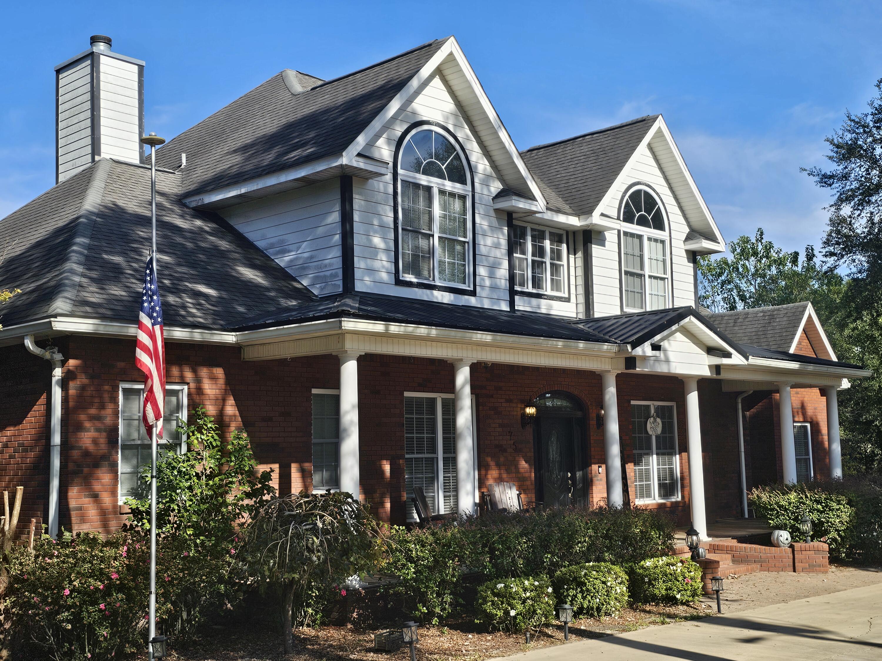 Assumable FHA 4.99% loan! Traditional Southern Oasis sitting on approx 2 acres! This stunning 5 bedroom 3.5 bath home overlooks a beautiful crystal clear private spring fed pond with access to a second one as well. The primary suite & updated bath with beautiful 6ft soaking tub, separate shower and His/Her closets is on the 1st floor. Open living Space with impressive floor to ceiling stone fireplace. The upstairs has 4 Bedrooms and 2 full bathrooms. The kitchen has beautiful granite counter tops, double ovens, and custom made white cabinetry.  This home sits high on a hill with a huge covered back porch and Deck that overlooks the pond and dock area, and this home has plenty of storage. Too many details to list, check out the photos or request your own private tour. See it today!! **per the seller.... Updated well with 1 1/2 inch lines and 1.5 hp pump. Sprinkler system has new 1 HP pump and uses the spring water. New 8x8 well house. New dishwasher and new fridge. Both AC units were replaced approx 3 years ago.