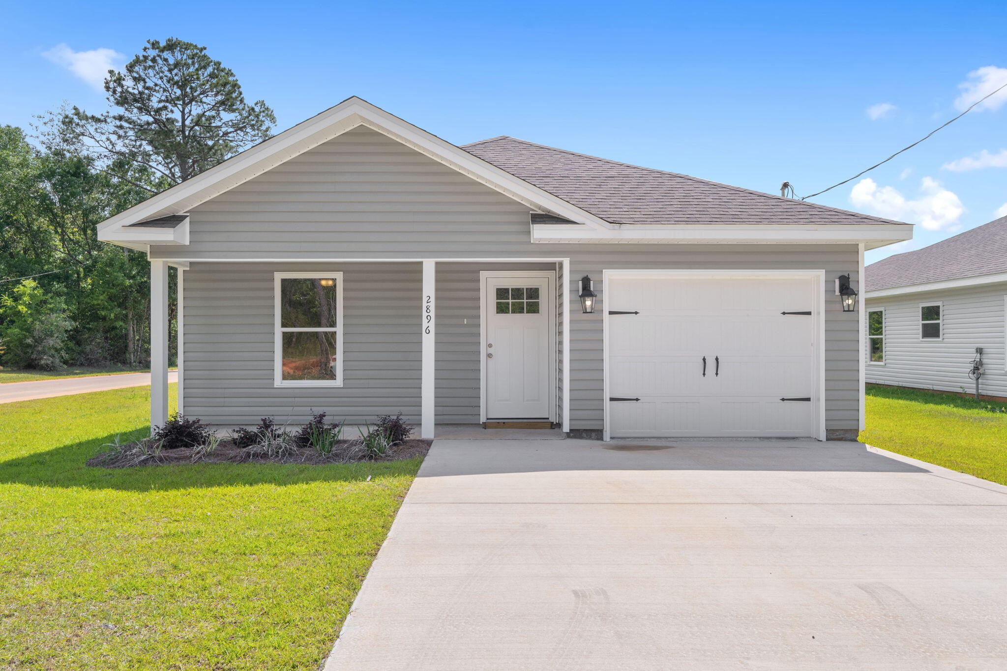 'Welcome to this new construction home, awaiting its first owner!' This 3 bed 2 bath home comes with LVP floors throughout the whole home, granite countertops and white shaker soft close cabinets. This well thought out plan features over 1373 square feet and a 1 car garage. The large covered porch welcomes you home. Upon entering the home from the spacious foyer, the two guest bedrooms are conveniently located at the front of the house along with laundry room and full bath. Just beyond the foyer is the open kitchen which overlooks the dining area and spacious family room. The kitchen features granite countertops and makes the perfect space for family gatherings. The oversized master bedroom is privately located at the back of the home and boasts an incredible en-suite bath with double vanity, granite countertops, shower and enormous walk-in closet. With a front and back porch as an extension of this home, you can enjoy the tranquility of Avalon Beach. Home comes with a one year Builders Warranty. Call today to ask about our incredible rate buy-down programs with our preferred lender for a significant reduction to your interest rate.
