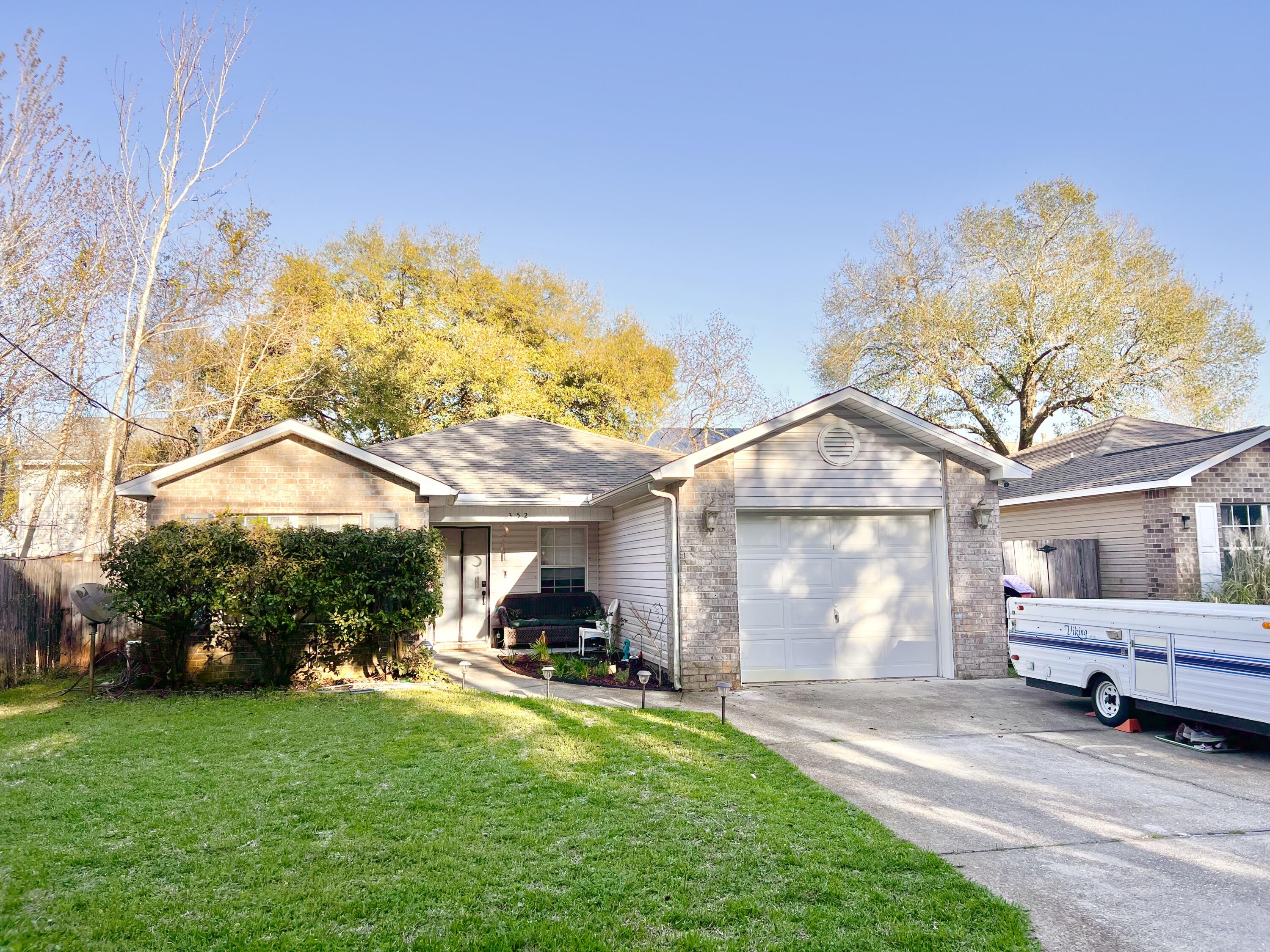 Showings to begin Saturday, March 21, 2026. Great family three-bedroom, two-bathroom home in Mary Esther! This move-in ready home is an easy Hurlburt commute. It would also be a wonderful investment opportunity as the quiet street has only a few houses and no through traffic.  Easy maintenance. Split floor plan. Laundry room. The master bedroom easily accommodates a king size bed and a spacious master bath. The living room is also well designed and currently accommodates a large section, standard furniture a good amount of kid stuff while still feeling open and spacious.  The kitchen has plenty of cabinet space and the dining area is not cramped accommodates a large table. The additional bedrooms share their own hall and bathroom.  This is a home you will love!!