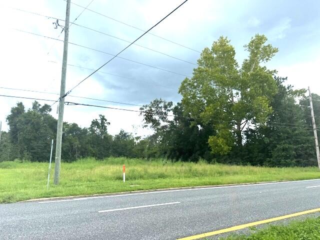 Partially cleared commercial land opportunity in the rapidly growing Fountain area--over one acre with 120 feet of frontage on Highway 231 and zoned C-3 for a wide range of commercial uses. This vacant corner lot at Burke Road and Highway 231 offers excellent visibility and easy access, making it ideal for service-oriented businesses seeking high exposure. Situated along US Highway 231, a major four-lane corridor connecting Central Alabama to the Florida Gulf Coast and Panama City, the property benefits from consistent, high-traffic flow. This prime location supports strong potential for retail, dining, automotive services, or other commercial ventures. All measurements and information are approximate and should be verified by the buyer with Bay County or the City of Fountain.