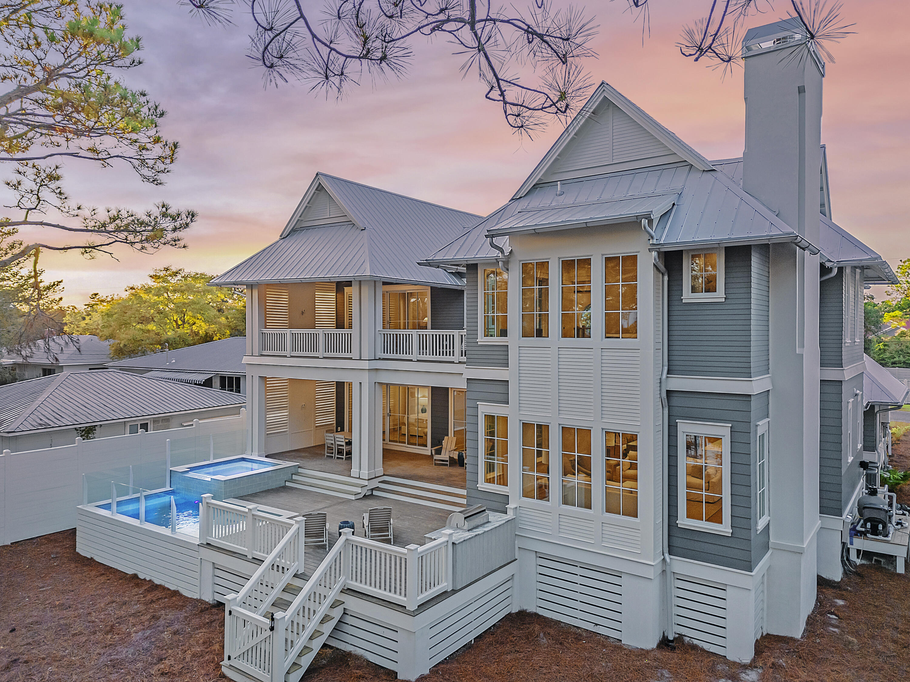 LISTED $200,000+ BELOW THE MOST RECENT APPRAISAL!! Welcome to 51 Lakeview Drive at The Cove at Tresca Lake. This luxurious home is perfectly situated on the south side of 30A between Eastern Lake and the Gulf of Mexico and presents an incredible investment opportunity, with rental projections exceeding over $271,000+. The unique property offers a beach/coastal dune lake lifestyle and sits adjacent to Tresca Lake, providing a tranquil environment and a serene lifestyle. This gem of a home boasts four bedrooms with an additional bunk/office area, two primary bedrooms on the first and second floors, and 4.5 baths, making it ideal for families or groups of friends. The two primary bedrooms feature exquisite wet rooms, walk-in showers, soaking tubs adorned with marble tile and Kohler fixtures creating a spa-like experience. Inside, you'll find 10' ceilings, custom cabinets and tile, hardwood flooring, and top-of-the-line Thermador appliances, catering to the needs of any chef. The expansive lower and upper decks overlooking Tresca Lake provide ample space for entertaining and relaxation. Step outside and enjoy the raised spa and heated saltwater pool, perfect for refreshing dips or unwinding under the sun. The outdoor living areas also feature a summer kitchen and a TV wall, ensuring a delightful space for hosting guests and creating lasting memories. The two-car garage offers convenient storage for vehicles, bikes, and beach toys.
The Cove at Tresca Lake is a stunning boutique development featuring five luxurious new homes. Nestled between Tresca Lake, Eastern Lake, and the Gulf of Mexico, this community offers a harmonious blend of beach relaxation and outdoor adventure. Each home is meticulously designed with high-end finishes, including shiplap walls and vaulted wood accent ceilings, evoking a cozy yet sophisticated atmosphere. Don't miss out on owning a slice of paradise on 30A. Schedule a private showing today and experience the ultimate in luxury coastal living!