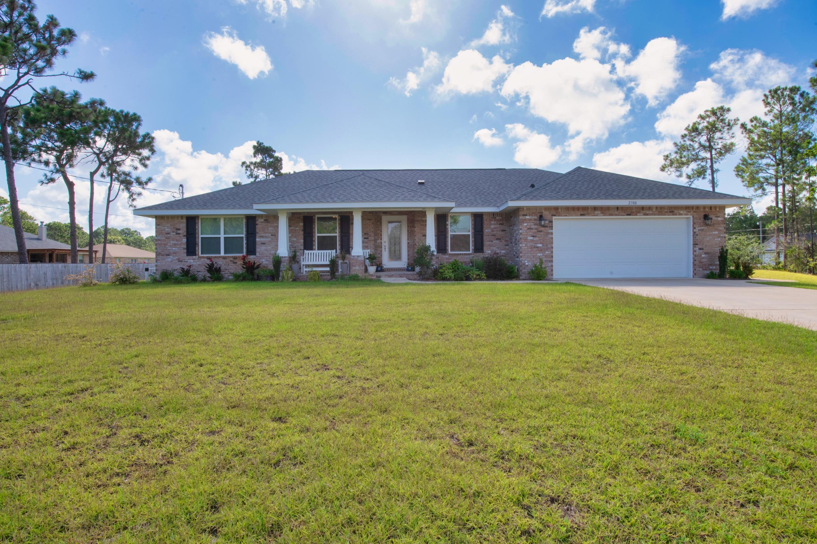 Beautiful  4 bedroom, 2 with walk-in closets,  2 full bath brick home on a large corner lot covered with green grass maintained w/ sprinkler system. 14X16 large covered porch. washer and dryer DO NOT convey. There is a transferable termite bond,  Freezer, washer, and Dryer DO NOT convey. The island in kitchen DOES CONVEY
MUST  WEAR MASK AT ALL TIMES WHILE INSIDE THE HOME, PLEASE. EVEN IF FULLY VACINATED! medical reasons of current owner.  
SHOWING TIMES: EVERYDAY from 11-4