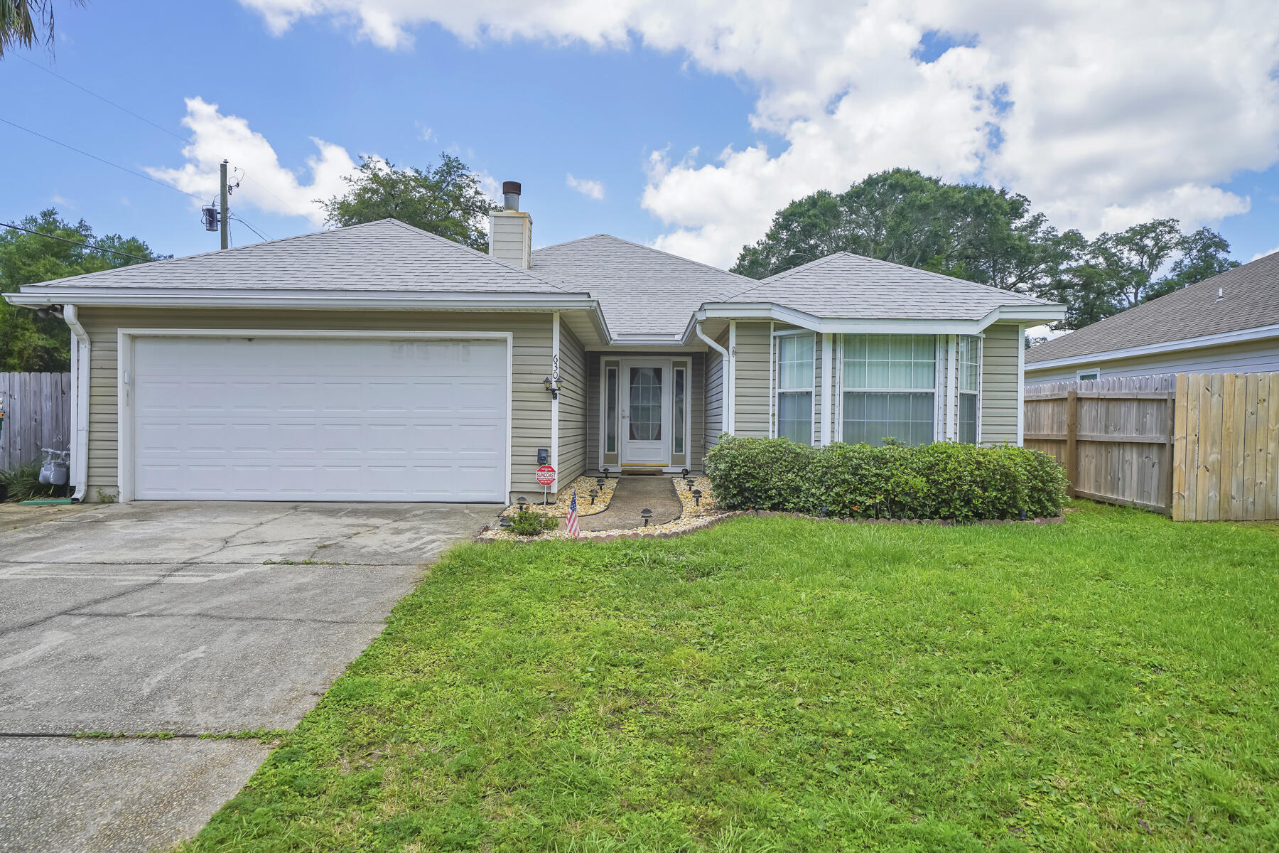 Nestled in the heart of Fort Walton Beach this split bedroom floor plan home has what you are looking for.  This 3 bed 2 bath home is conveniently located in close proximity to shops, schools, beaches, and bases. As you enter the home you will notice the large living room with a cathedral ceiling, gas log fireplace, and built in shelving. To the right of the living room is your guest area, with two large rooms and a loo for your guests. As you cross the living room you will find the kitchen and dining room area that has an exit to the covered patio and fenced in yard. Back inside, across from the dining room is the master bed and bath and an added bonus room perfect for an office space. Roof was replaced in 2017 and there is a 15 kW 60 Hz GUARDIAN PLUS AIR-COOLED HOME GENERATOR by Generac.