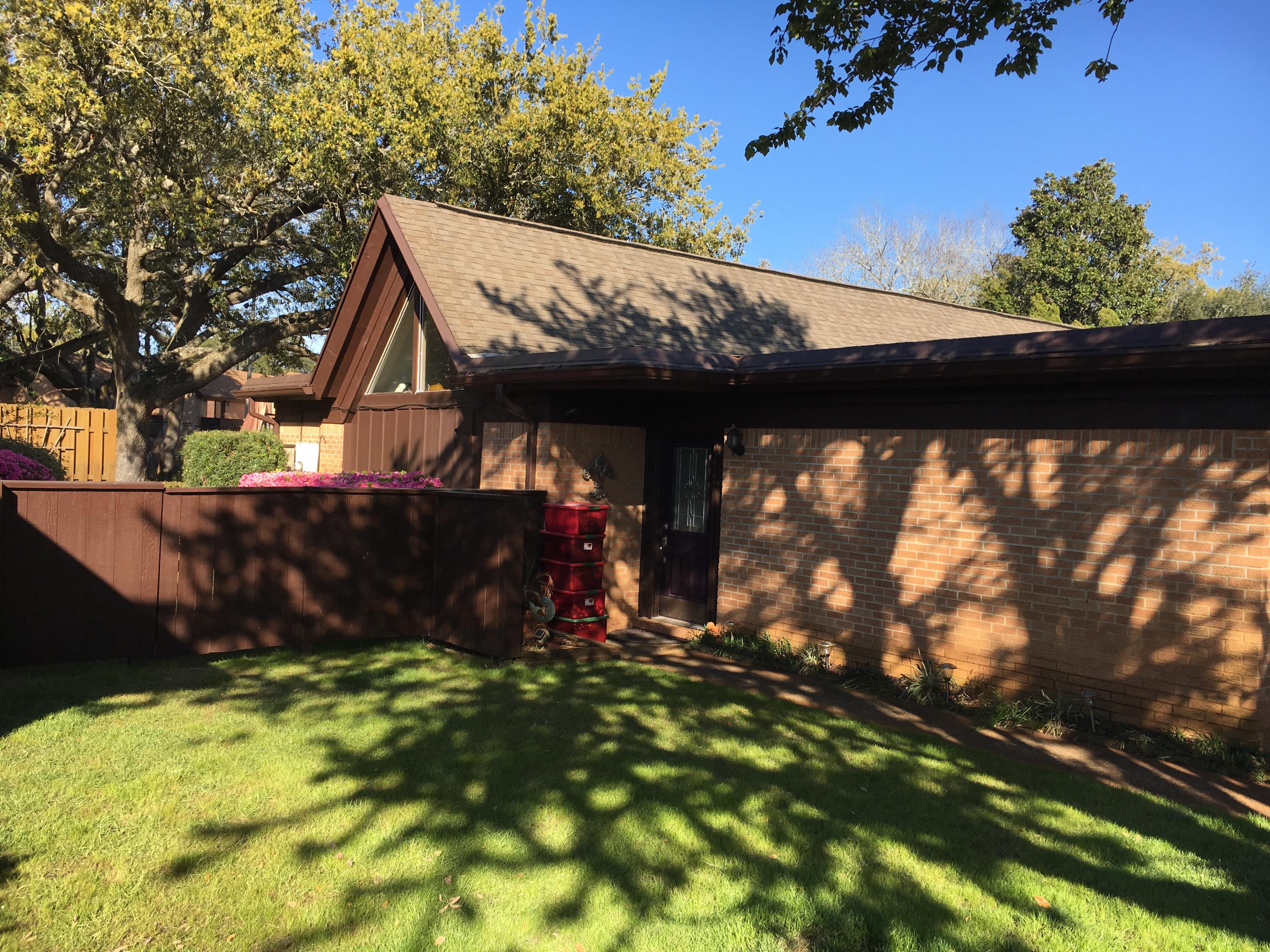 This recently updated townhome was remodeled in 2017 giving it an open floor plan. Located in the heart of Destin. Mossey Cove Bayfront complex is surrounded by mature, live oaks and magnolias. This two bedroom, two bath single level townhome has vaulted ceiling in living area with lots of windows and natural light. Up Dated in 2017 the Kitchen features granite counter tops, Custom soft close cabinets, new stainless steel Refrigerator and dishwasher.New tank less hot water heater and New A/C was installed in 2015. Enjoy an Olympic sized pool, community room, tennis courts, boat launch. Assigned parking space directly in front of unit. Great location