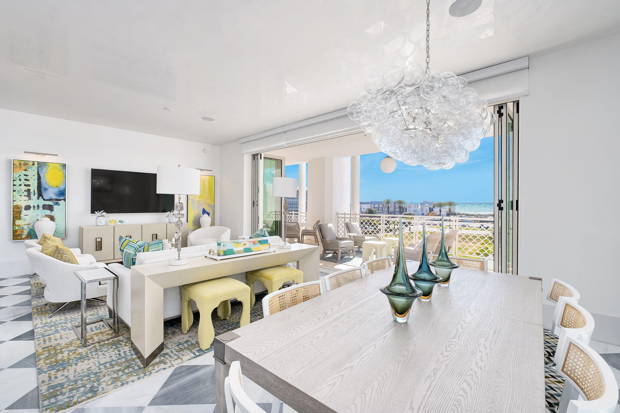 Welcome to The Della at Alys Beach, where your dream of sophisticated coastal living comes alive. Get ready to fall in love with this awe-inspiring condominium residence, a luxury sanctuary perched on the highly sought-after third floor on the west side, a prime corner location lending ample sunlight with windows flanking the west side. Imagine waking up to spectacular views of the amphitheater and the shimmering Gulf of Mexico, all while embracing a lifestyle drenched in elegance and comfort. As you step inside, prepare to be captivated by the meticulously crafted interior that boasts not just space but a sense of serenity. Both bedrooms are impressively spacious, with direct access onto the large balcony, and the stylish bathrooms feel like your very own spa retreat. Floor-to-ceiling glass windows draw in a flood of natural light, creating an inviting atmosphere that wraps around you in every corner. Step out onto the expansive balcony over 600 square feet of pure bliss, perfect for hosting unforgettable gatherings with friends or simply basking in tranquil moments as you soak in the breathtaking surroundings. With unobstructed Gulf views framed by the vibrant plaza at The Beach Club, this town center residence transforms every day into a delightful getaway. The residence has been thoughtfully enhanced with over $100,000 in luxurious upgrades, showcasing only the finest materials and finishes. Be wowed by the stunning Venetian plaster in the common areas that exudes sophistication, while the CaesarStone Ocean Foam countertops add a chic touch to your culinary adventures. Enjoy timeless beauty with reclaimed Spanish marble and European Oak flooring that harmoniously blend elegance and practicality, complemented by sleek slab-style cabinets that provide ample storage for all your essentials. Indulge in the opulence of the bathrooms, adorned with striking statuary and deep blue De Savoie marble finishes that elevate your daily rituals to new heights. For the culinary aficionados out there, you'll be impressed by top-of-the-line Wolf and Sub-Zero stainless steel appliances, making every meal an experience in itself. Plus, with electronic shades in every room, you'll have both convenience and privacy at your fingertips. Just a leisurely stroll away lies the renowned Caliza Pool and the fabulous Beach Club, allowing you to fully embrace a vibrant coastal lifestyle filled with sun, sand, and exciting community activities. Fully furnished with a chic South Florida interior design. this residence bursts with color and character, adding a unique charm to the essence of Alys Beach. It's time to grasp your chance to own a slice of paradise in one of Alys Beach's most coveted spots! Your coastal dream awaits.