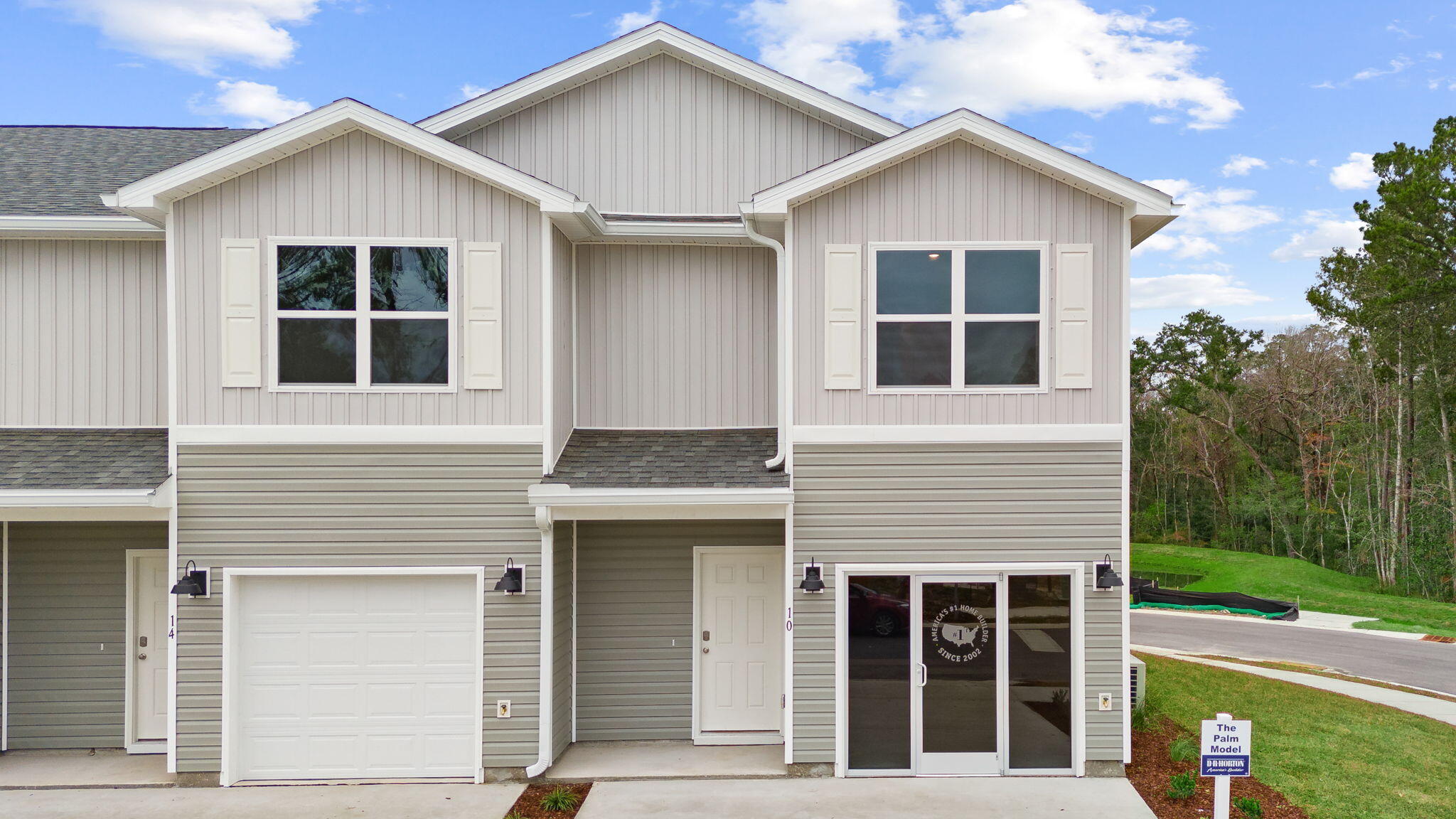 Welcome to 32 Rudder Lane at Genoa Landing Townhomes in Freeport Florida. This is an exterior unit that is located in a four unit building that is under construction. As you enter this townhome you will find a hall with EVP flooring that leads to an open-concept kitchen, living, and dining area, designed for entertaining and everyday living. The dining area is surrounded by windows that allow for natural light. The kitchen serves as the culinary center with its spacious center island and cabinetry for storage as well as a pantry. The kitchen has been appointed with stainless appliances including a stove, microwave and dishwasher and quartz countertops