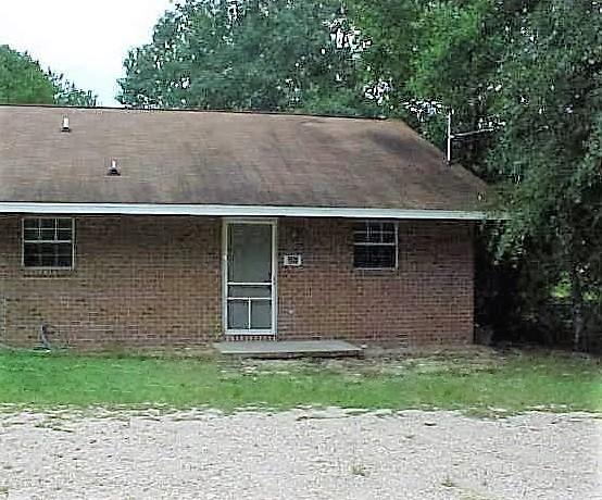 OCCUPIED! Please call ERA to set up and appoint to view. 2BR/2BA duplex with roomy living room, kitchen, dining area, master bedroom and bath, one additional bedroom and another full bath. Lawn service is provided. Won't last long, call today!