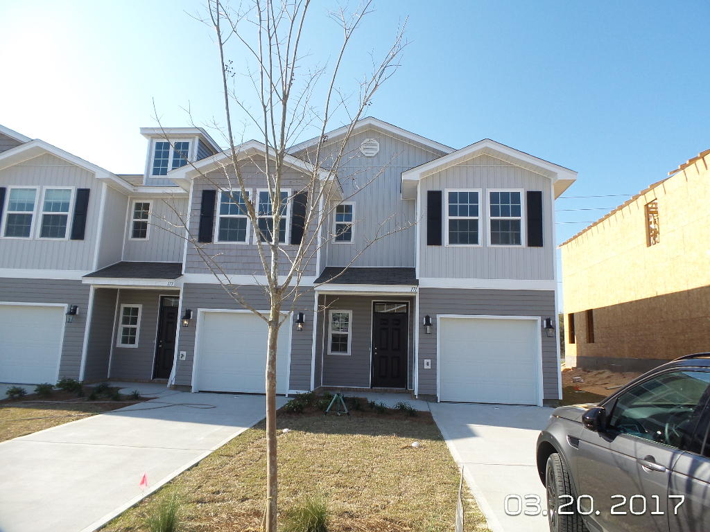 Available NOW!!!!...Brand new town home end unit just waiting for you. 3/2.5 floor plan, beautiful kitchen, open concept living, 1/2 bathroom downstairs, wood look flooring in the main living areas. Upstairs are 3 bedrooms and 2 bathrooms. Laundry and new carpet. 1 car garage, open back patio and easy access to bases, beaches and shopping. No inside smoking. No pets allowed.