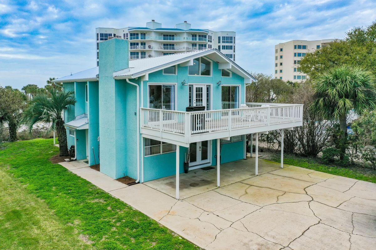 Under contract - accepting back up offers.Laze in the sunshine with views of the gulf, harbor and Destin jetties from this single-family home that fully delivers on the charm of the Old Florida lifestyle. Not currently on a rental program, this three-bed home sits on a large lot close to the activities and restaurants at Destin Harbor. It also features two living areas for convenience and a wraparound porch on the second level perfect for cocktails at sunset or alfresco dining. Water lovers will enjoy boating access just 20 steps from this home and the privacy and intimacy the property itself provides. With projected rental income of more than $100,000 annually, this would also make a great rental investment with snorkeling right out the back door and a nearby water taxi for  shuttling between the best Destin Harbor has to offer.
Recent updates include:
-New Refrigerator 
-New Water Heater
-Two new electrical switch boxes
-New Roof
-New Gutters
-New Front Door
-Freshly stained exterior decks and paint on railings
-Additional furniture and open shelving