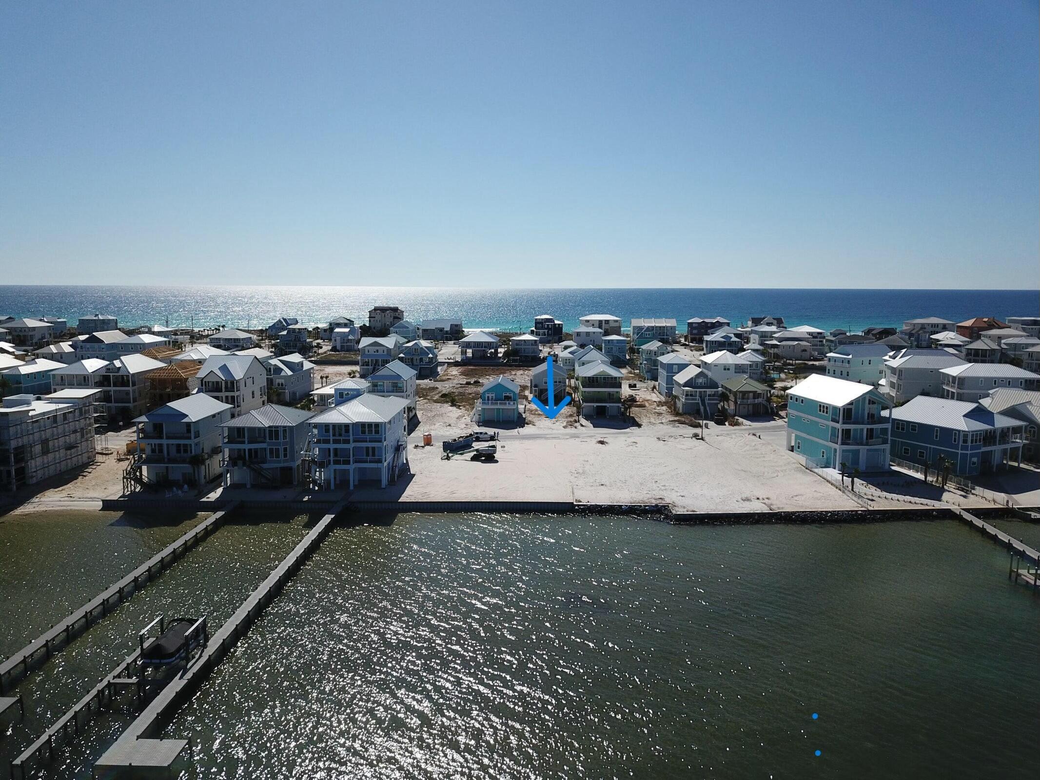 BRING ALL OFFERS!! Motivated Seller!! Incredible Opportunity on Grand Navarre Blvd - Your Dream Beach Lot Awaits! 

Don't miss your chance to own a prime lot on the western end of Navarre Beach! This exceptional property offers breathtaking views of the Sound, year-round sunsets, and easy access to the pristine beach. The lot is spacious, providing the perfect canvas for your dream beach house, with plenty of room for outdoor living areas and a pool. Located in a charming neighborhood with no HOA and no rental restrictions, this property is ideal for personal use or as a potential home vacation rental. Enjoy water activities, natural beauty, and a laid-back community. This is your opportunity to invest in one of Florida's most desirable coastal locations!
