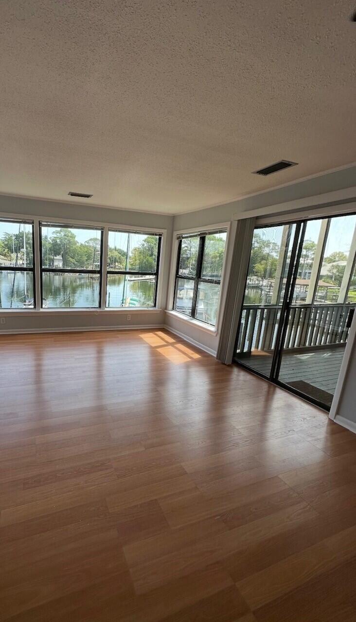 **$500 off first month's rent for military or first responder** Waterfront 1-Bedroom Condo with Stunning Views! Enjoy breathtaking waterfront views from this beautifully maintained 1-bedroom, 1-bath condo on the 2nd floor. The unit features newer carpet and fresh paint, as well as a convenient in-unit washer and dryer. Located next to the Bluewater Bay Marina and LJ Schooners, this desirable community offers the perfect blend of relaxation and convenience—just minutes from Eglin AFB and the Mid-Bay Bridge. No smoking. Pets will be considered. One year lease, security deposit, and application fee required.