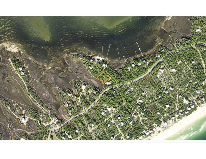 1 acre lot on marsh with potential views of the bay.  Perfect spot in The Plantation for your future home.
