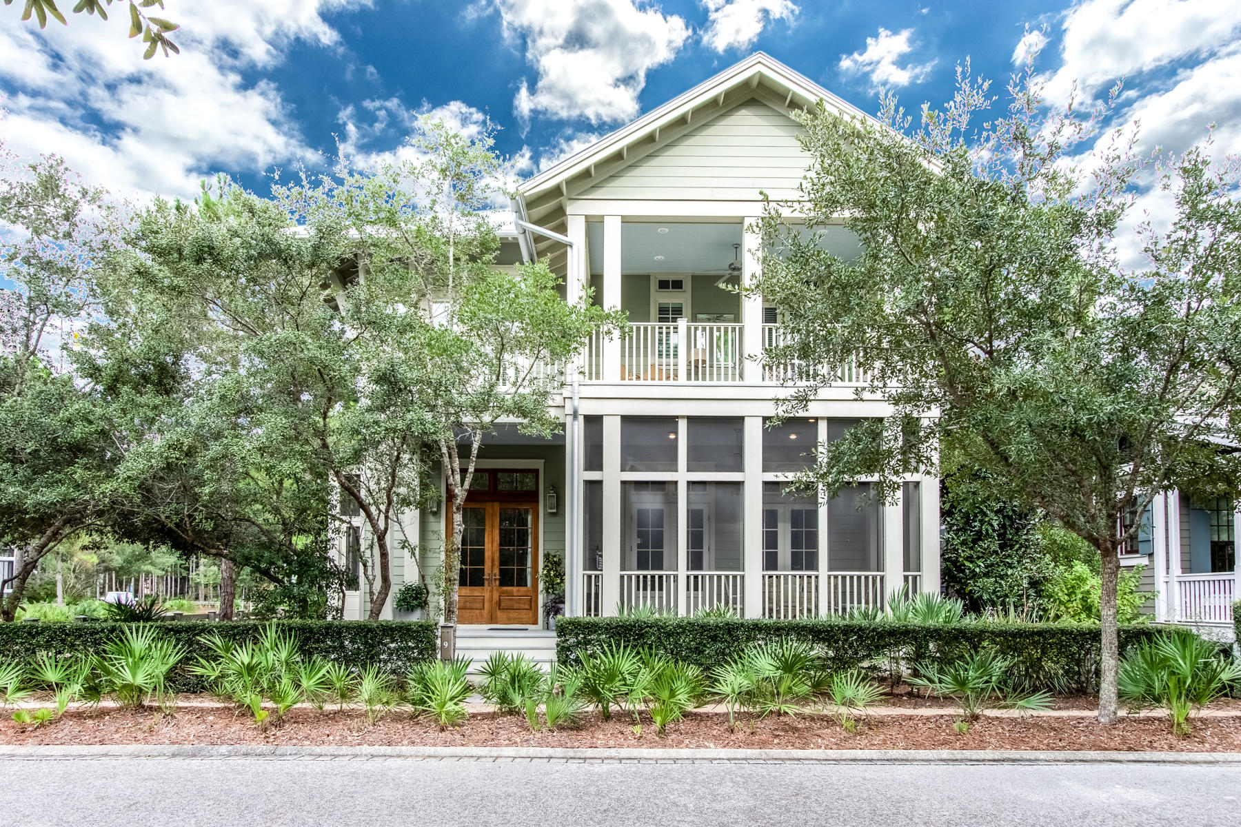 Situated on a corner lot, and overlooking a lovely pocket park, this home is conveniently located in Camp District of beautiful Watercolor Resort. This five-bedroom plus bunk room, 4.5 bath home was built in 2014 by Boyd Martin offers 3,114 SF of finished space and almost 1,000 SF of porches. Upon entering the home, you will love the spacious open-concept design, abundant windows, 12ft ceilings and a front and side screened in porch which add to the indoor living space. Special care was taken to select the interior finishes which include beautiful reclaimed floors throughout, door frames and main wall in downstairs master bedroom all from a Tobacco factory, marble kitchen countertops, custom cabinetry, solid core interior doors, 2 master suites, 12 ft ceilings on the 1st floor, 11ft.. ceilings on the 2nd floor and so much more. Five bedrooms include two master suites with spa like master-baths, one on the first floor, and the other on the second floor, two additional guest bedrooms plus a bunk room that can easily be converted to a second floor living space and an office. The home offers ample storage, ample attic storage, tankless hot water heater and hurricane-rated windows, and doors.  Plenty of room to add a private pool.  Site-plan options for adding a private pool and firepit area are available upon request. 
**The Watercolor Amenity Assessment for this home has been PAID in full. 
Located on 499 acres in the renowned South Walton Beaches, Watercolor was created with families in mind and offers the charm of small town life. Watercolor Resort is tucked between the beautiful beaches of the Emerald Coast and Western Lake, a natural 220-acre coastal dune lake. Watercolor is rich in natural beauty and offers exceptional community amenities which include a new homeowner owned gulf front beach club, featuring three pools, a full-service restaurant, new restrooms and easy beach-to-pool access. The recently updated Camp Watercolor offers a lazy river and slide, multiple pools, park, lush green spaces and food service. Enjoy miles of walking and bike trails, a boathouse offering kayaking, canoeing and paddle boarding, outstanding tennis facility and a short biking distance from the shops and restaurants in Seaside. Every year since 2013, Watercolor resort has received Forbes' Four Star designation, making it the most decorated property in northwest Florida and beginning in 2016, and every year since, the readers of Conde Nast Traveler voted it the region's number one resort.