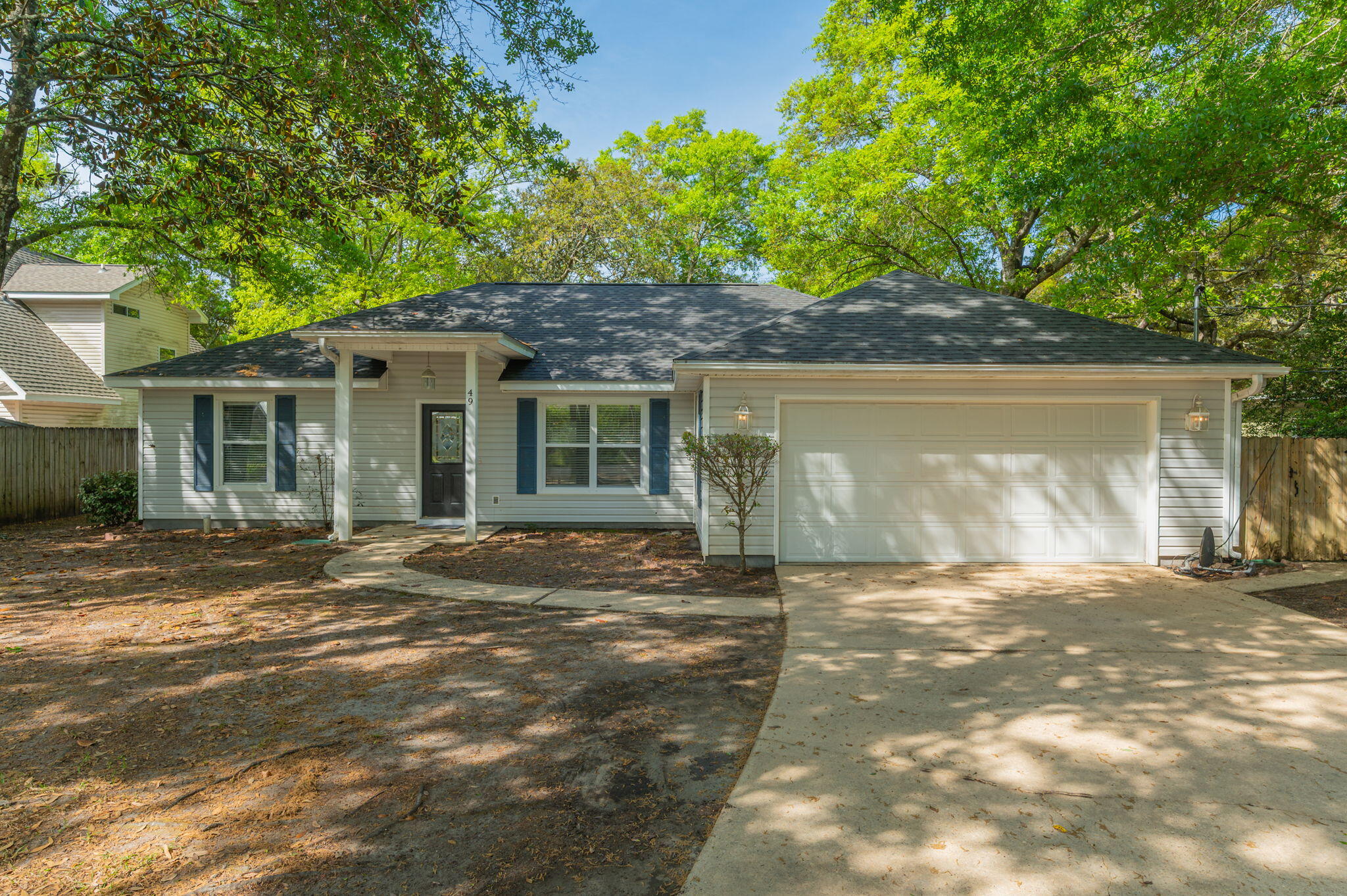 Move-in ready! This gem is perfectly located just minutes from Eglin AFB and Hurlburt Field, making daily commute a breeze. Whether you're moving in or relocating across town, this home checks every box. Step into the bright, open living space where hard floors and a large kitchen create an impressive, welcoming vibe. 
Love to cook? The massive kitchen is a storage dream, featuring stainless steel appliances, tons of cabinets, breakfast bar and expansive counters. The dining room boasts glass doors leading to your private patio and fully fenced large backyard. Main areas all have wood flooring. Bedrooms feature ceiling fans and carpet. The large backyard is fully fenced and level. Bonus storage building in the backyard as well as a full 2 car garage with auto opener.