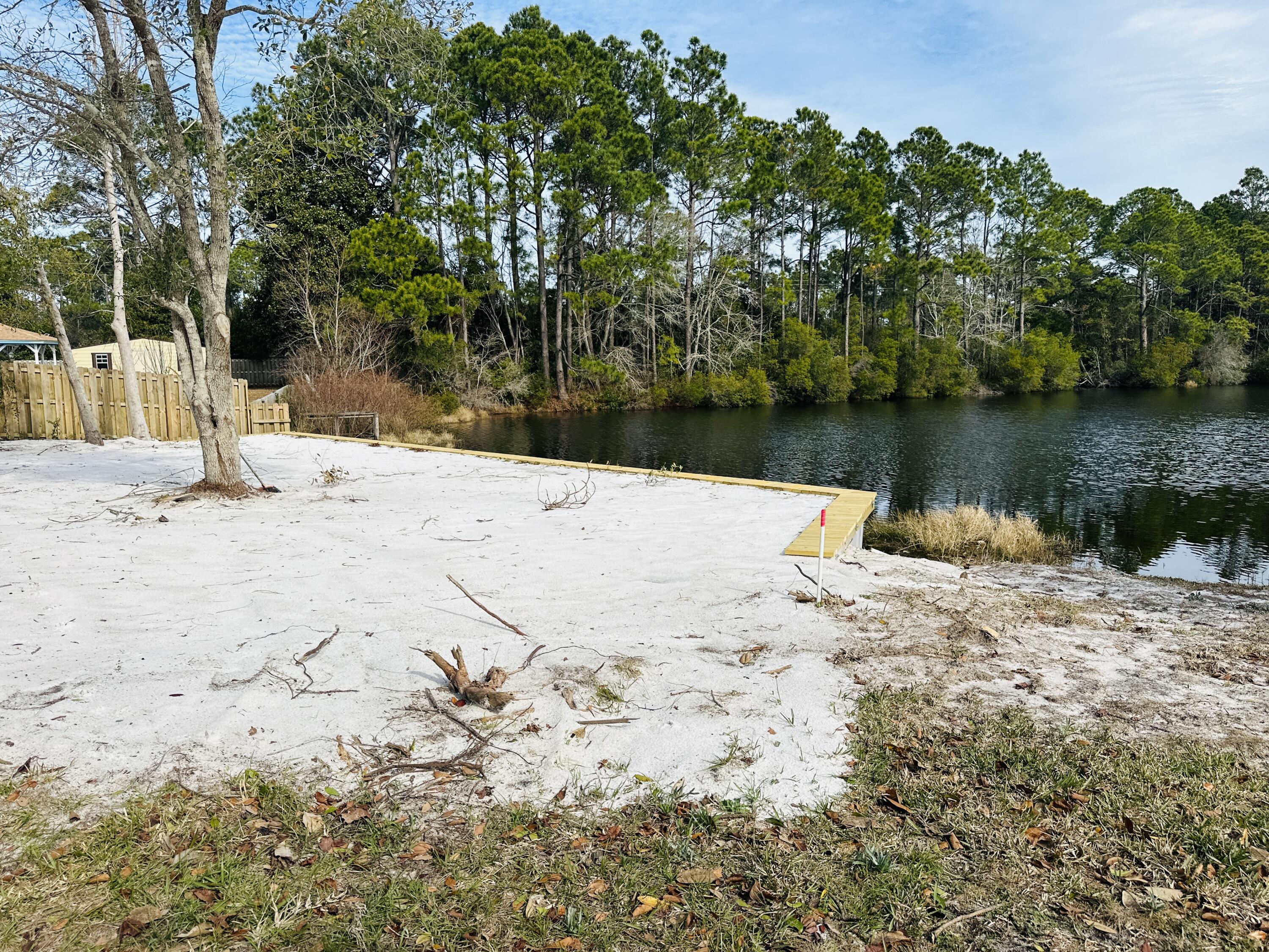 Come build your dream home on this cleared 0.40 acre lot boasting 75 feet of lakefront footage. Featuring a professionally constructed seawall (the seawall alone costs $30,000).
Well established family oriented, sidewalk lined neighborhood with NO HOA. This Lot is the ideal canvas for your new home, offering unobstructed views of the serene lake surroundings.
Lot is not in a flood zone.
