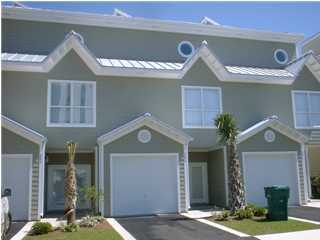 Beautiful location right across the street from the Gulf with awesome views from all three levels. Beach access with heated pool and cabana, 9' ceilings, ceramic tile entryway, baths and kitchen. Huge floor plan with attached 1 car garage, entertainment room (or guest room) with kitchenette/wet bar area, laundry area, full bath. 2nd level has living area, kitchen with corian countertops, 2nd bedroom with full bath. 3rd level has a huge master suite with sitting area and gulf views, full bath, wet bar with sink. Convenient location close to all Destin attractions.