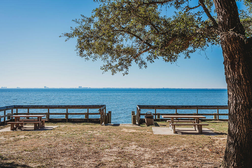 Discover the freedom to build your dream home on this .17-acre homesite in the laid-back Villa Tasso community — a quiet pocket of Walton County just minutes from Bluewater Bay, EOD School, and the beaches of Destin.

This unassuming yet charming neighborhood offers a mix of homes, all without the restrictions of an HOA. Here, you'll enjoy a sense of space and individuality rarely found this close to the coast — where neighbors wave and oak trees sway.

Outdoor enthusiasts will appreciate being near Villa Tasso Pocket Park, Turkey Creek Nature Trail, and Fred Gannon Rocky Bayou State Park, offering easy access to walking trails, kayaking, and Florida's natural beauty. With Choctawhatchee Bay just across the way, boating, fishing, and breathtaking sunsets are never far from home. Whether you're ready to build a primary residence, a weekend retreat, or an investment property, this homesite combines the serenity of rural Florida living with unbeatable proximity to Niceville, Destin, and the Emerald Coast's best amenities.