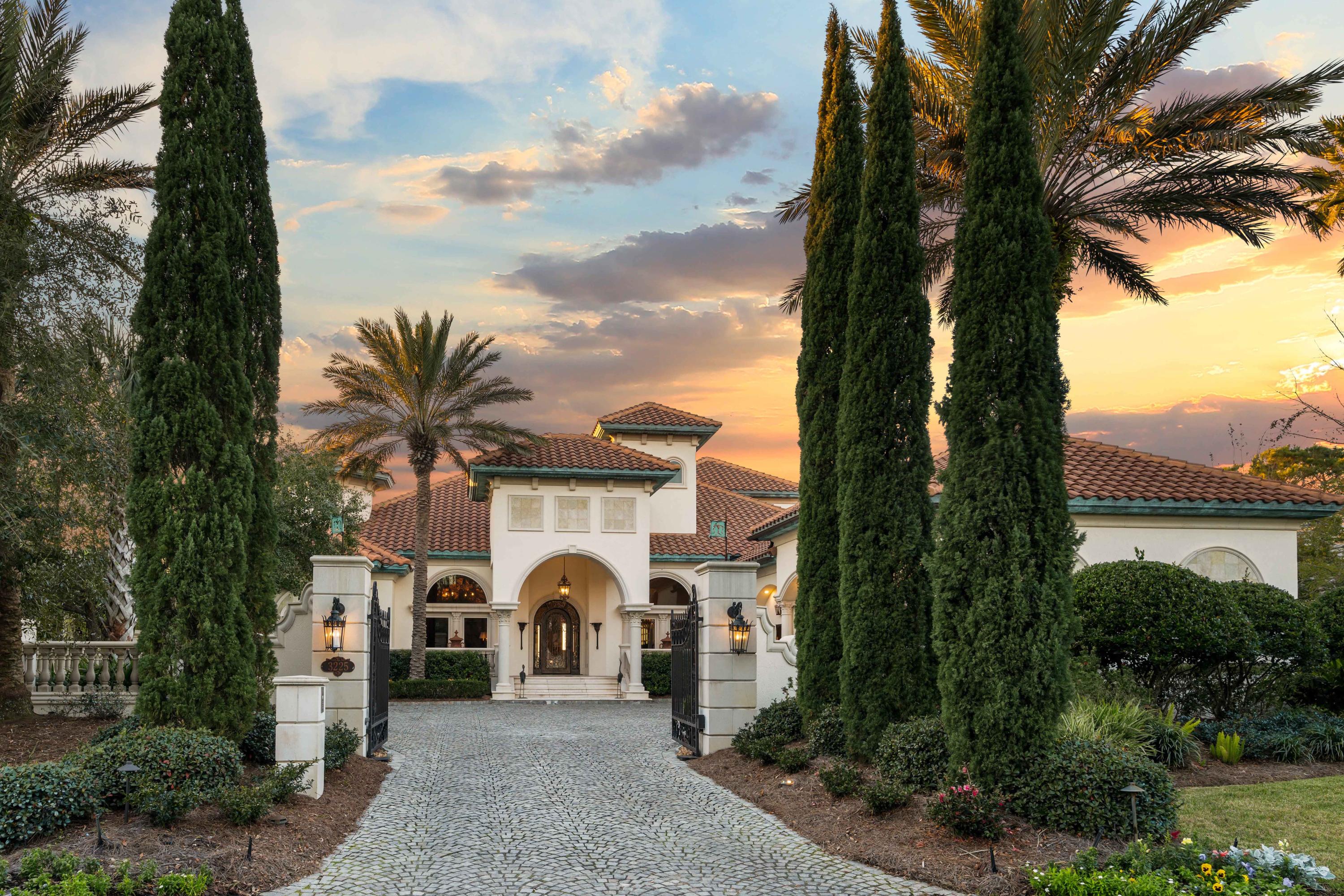 Welcome to a home that is inviting and breathtaking all at once, incorporating Floridian Bayfront living with resort luxuries. This gated estate encompasses 107' on Choctawhatchee Bay with golf cart access to The Village of Baytowne Wharf with full-service Marina, boutiques and eateries, along with the Sandestin Golf and Beach Resort at your doorstep. This is a home that effortlessly welcomes your guests one evening, while granting comfort and privacy to your family every day. Four of the five Bedroom Suites have Bay views and open to the outdoor living area including infinity pool, jacuzzi, and private dock with boat and jet ski lifts. A second entertainment kitchen, dining and living area open to the outdoors with sliding glass walls. Design masterwork abounds in this home. .
