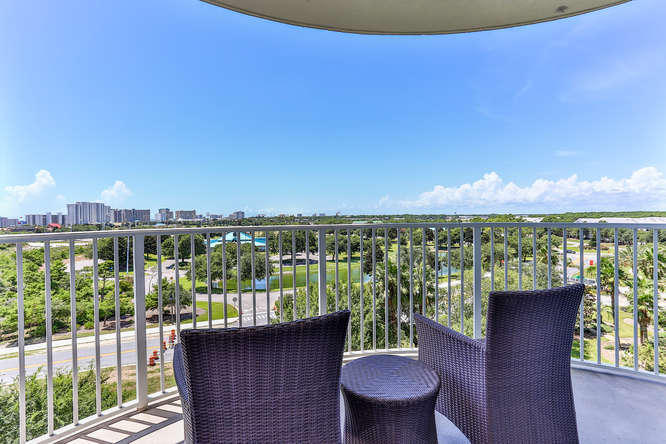 Priced to sell! Beautiful 1 bedroom, bunk room and 2 bath condo that will make a great investment or vacation property. This fully furnished westerly facing unit has partial gulf views and is ready for its new owner. The updated kitchen features granite countertops and maple cabinetry. Great location in close proximity to the beach, great restaurants and shopping. The Palms feels like a luxury resort with its huge lagoon pool complete with waterfalls and jacuzzis. Other amenities include: a children's splash pool, tennis courts, basketball court, fitness center, playground and covered parking. There is also a seasonal shuttle service to the beach.