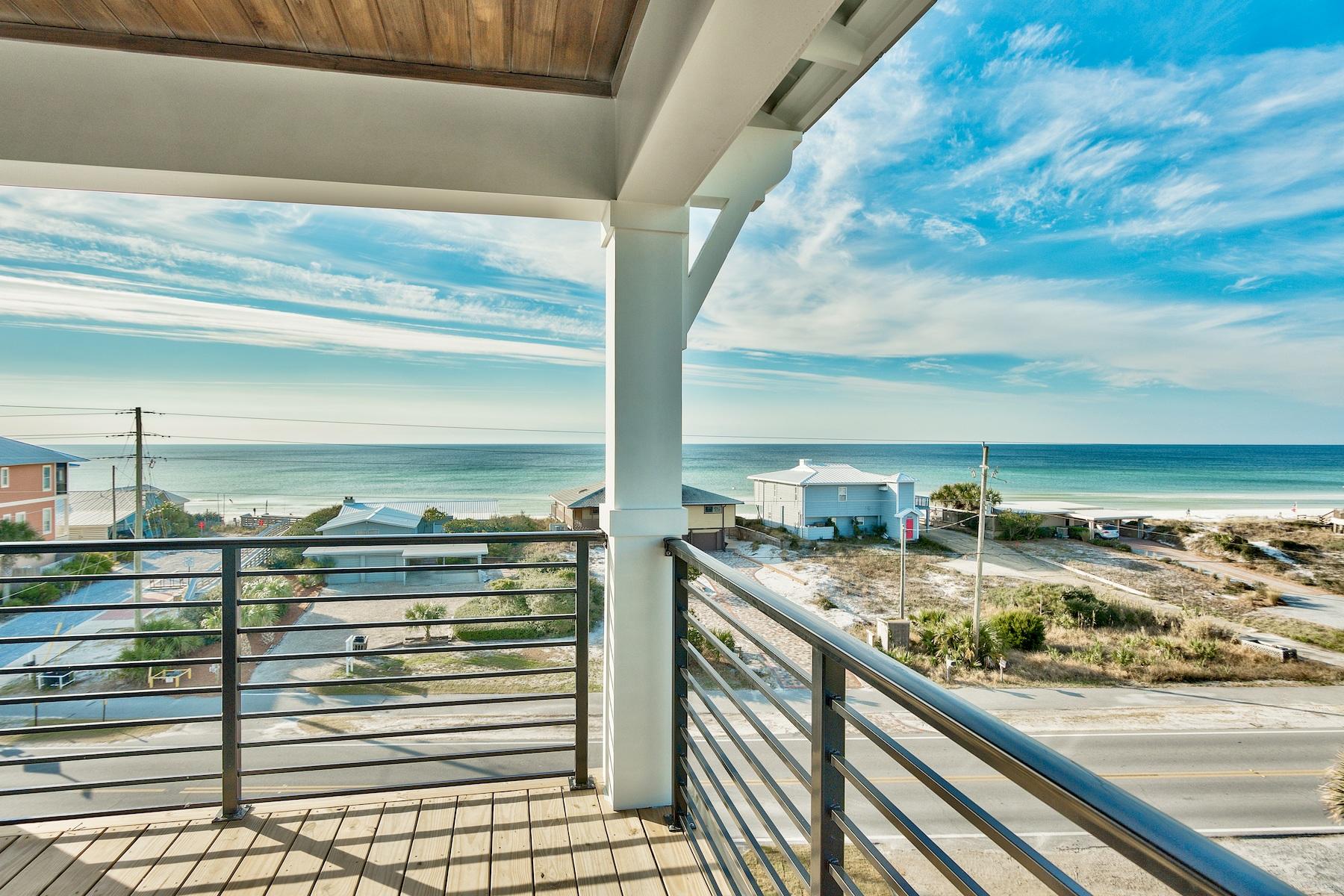 Beautiful coastal contemporary new construction perfectly situated on 30A defined by a prominent second tier site capturing panoramic gulf views from an impressive four story vertical span & masterfully configured providing unparalleled amenities including a Watermark-built private resort style pool and a covered outdoor summer kitchen. This is the ultimate beach house, projected to be a top rental producer on 30A (+$200,000 projected gross income in 2019) and designed to maximize functionality with finely appointed chic coastal finishes while affording optimal comfort & living space. Notable features include multiple indoor and outdoor living areas, private commercial grade elevator, top floor master suite with unparalleled gulf views, built-in pinterest worthy bunkbeds as well as multiple living rooms with floor to ceiling windows soaking in the epic gulf views. The first floor layout boasts a spacious bunk room, laundry area, large living room with adjacent full bath as well as direct access to the rear pool deck with covered outdoor living area. The second floor features three large bedroom suites, each offering premium gulf views as well as ensuite bathrooms including a western facing secondary master with covered outdoor porch space. The third floor is the focal point of indoor living with a generously proportioned living room characterized by floor to ceiling windows to soak in the natural light & beautiful gulf views. This space is crowned with in-lay pecky cypress ceilings accentuating the coastal decor and open floorplan. The ample sized kitchen features floor-to-ceiling custom shaker style cabinetry, Thermador appliances and professional series range, ample storage and anchored by a massive center island crowned with gorgeous quartz countertops. The third floor also offers a guest suite with ensuite bathroom. The finished fourth floor is a rare bonus featuring a west/southwest facing master suite soaking in endless summer sunsets and gulf vistas while offering an oversized ensuite master bath complete with dual vanities and a walk-in shower. The fourth floor also features a south facing living room with large paneled glass focused directly at the pristine white sand beaches as well as an adjoining wet bar for entertaining. There is also a supplementary guest suite on the fourth floor complete with additional ensuite bathroom as well as a secondary laundry station for convenience. The West end of 30A offers privacy and serenity while enjoy multiple beach access points steps from the home and centrally located near world class golfing, dining, shopping & entertainment.