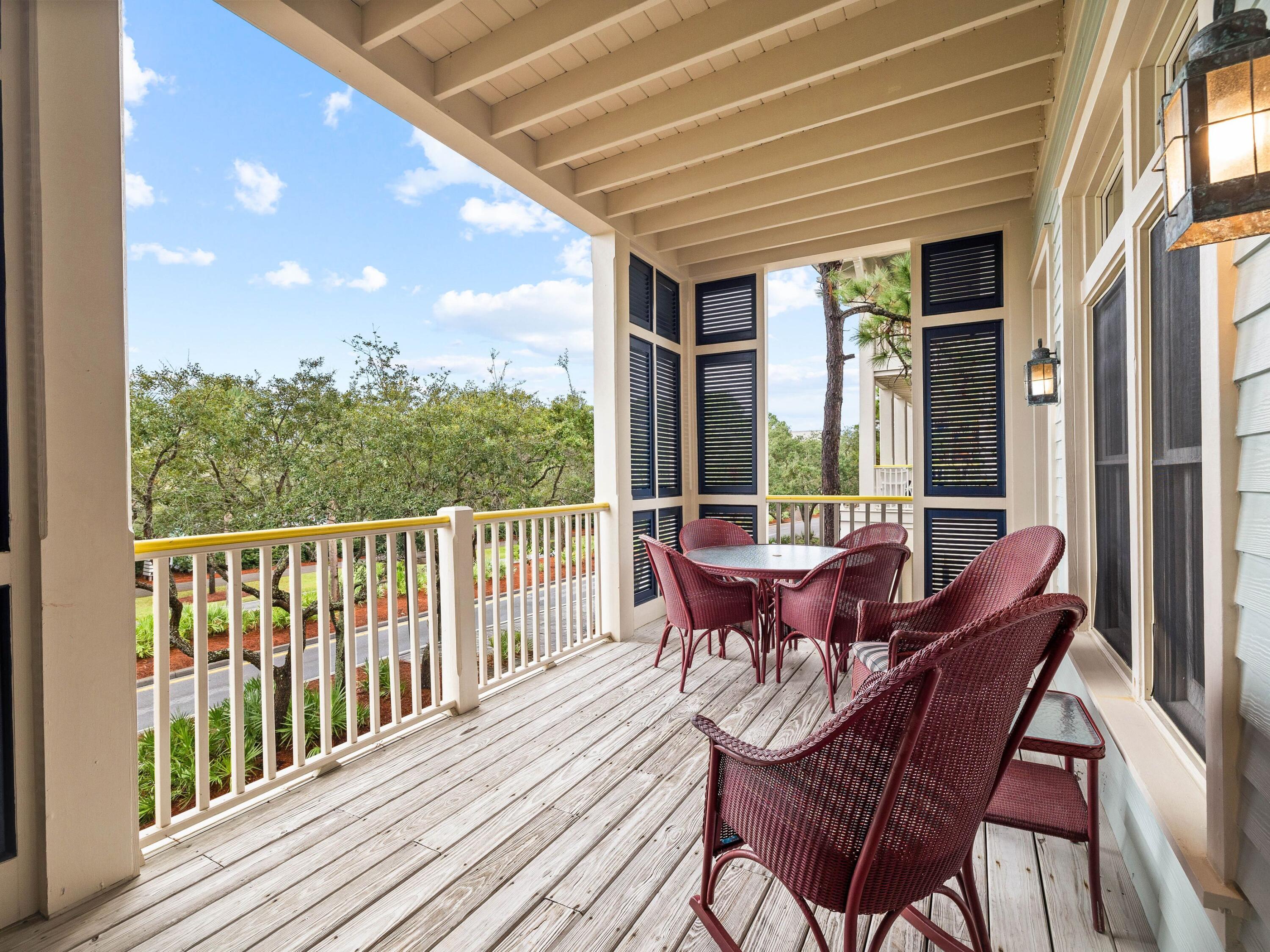 Imagine living two blocks from the beach in this two-story condo in WaterColor. Boasting a screened first-floor porch and a second-floor balcony, this is the perfect home for enjoying an alfresco lifestyle. This well-presented home has large windows, hardwood flooring and updated bathrooms. Coastal accents provide a touch of sophistication. The first floor has a primary bedroom with a king-sized bed, walk-in closet and private bathroom. It has access to a covered porch with a charming swing bench. There's also a queen guest bedroom, another updated bathroom and a washer/dryer on this level. Stairs rise to the second-floor living area, which is tastefully decorated and flooded with natural light. White wainscoting and stylish light fixtures add a touch of originality. A sleeper sofa provides additional space for overnight guests. The updated galley-style kitchen is well equipped for relaxing vacations or as a full-time residence. Granite counters and a subway tile backsplash enhance the white cabinets. Stainless steel appliances include a Sub-Zero refrigerator, Bosch dishwasher, ceramic cooktop, oven, microwave and multiple glass-front cabinets. A pass-through connects the kitchen with the dining area for entertaining. There's also a utility area and a newly renovated half bath. The sitting room opens directly onto the balcony, providing a sunny place to relax with cool drinks at the end of the day. The fully-furnished condo is perfectly located for beach lovers, being close to the amazing beach club. It's also right across the street from the WaterColor Inn and just steps from Fish Out Of Water Restaurant, Beach Happy Cafe, Scratch and The Candy Bar. Owners have the use of nine community pools, tennis courts, a fully equipped boathouse on Western Lake, Camp WaterColor with its lazy river and 25 miles of peaceful walking trails. What's not to love?
