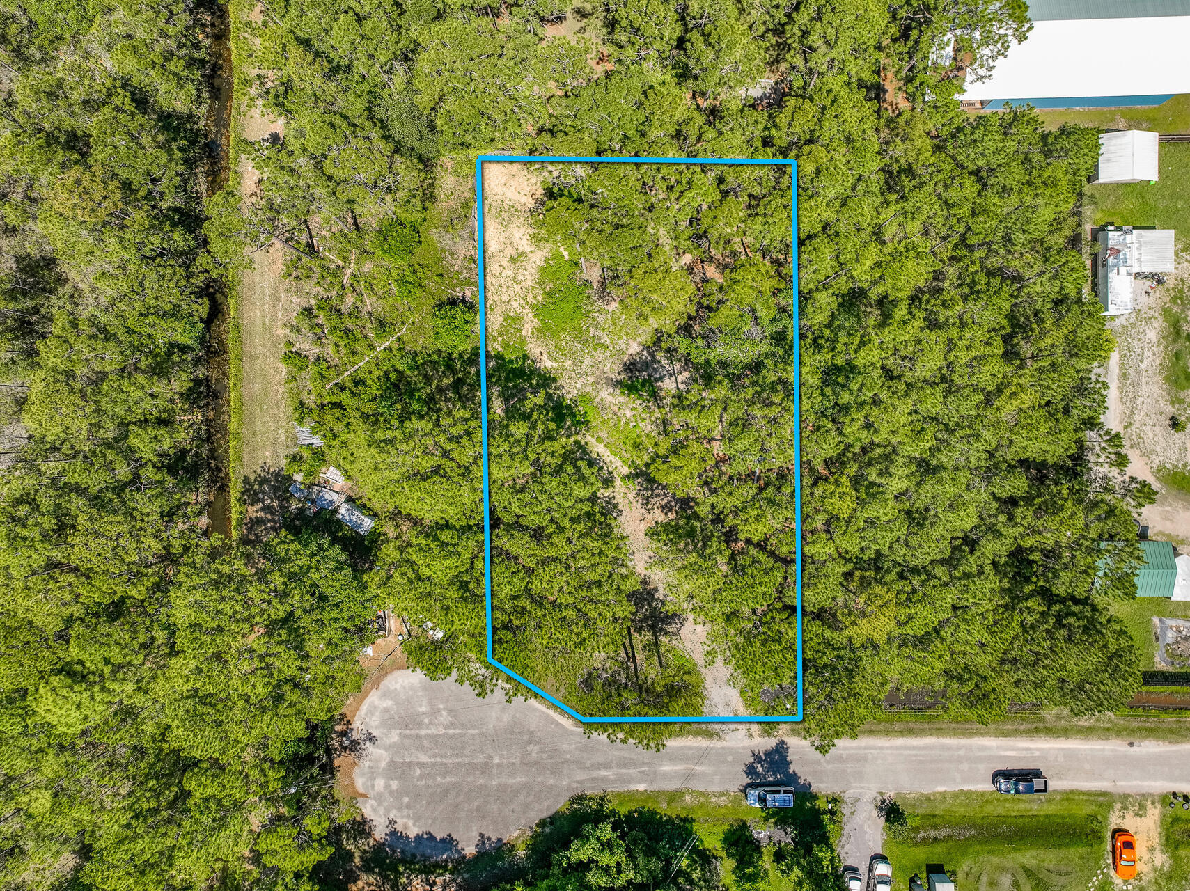 Great opportunity to own a 1/2 acre on a cul-de-sac lot In South Walton. Located off the quickly developing area of Chat Holly, this lot has county water and sewer connection available.