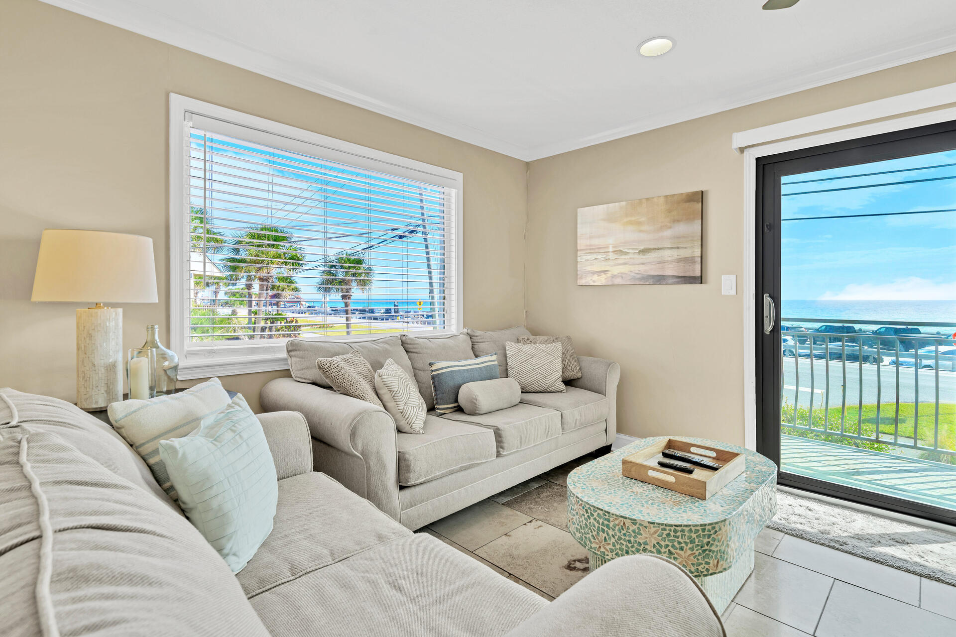 Come see the one and only Costa Vista Townhome on the market with a DIRECT GULF VIEW! Being an end unit this is perfectly situated and affords amazing views from all angles. On the first level you will find a covered carport made for two vehicles which is private and only designated for this unit- a rare feature at the beach! This townhouse features all tile floors throughout, washer and dryer, and TWO private balconies to watch daily sunrises and sunsets. Sold fully furnished and turn key ready. The HOA dues are low and the community pool is included! You are only steps away from the sugar white sand, Pompano Joe's, and the emerald green waters all for a GREAT price!
