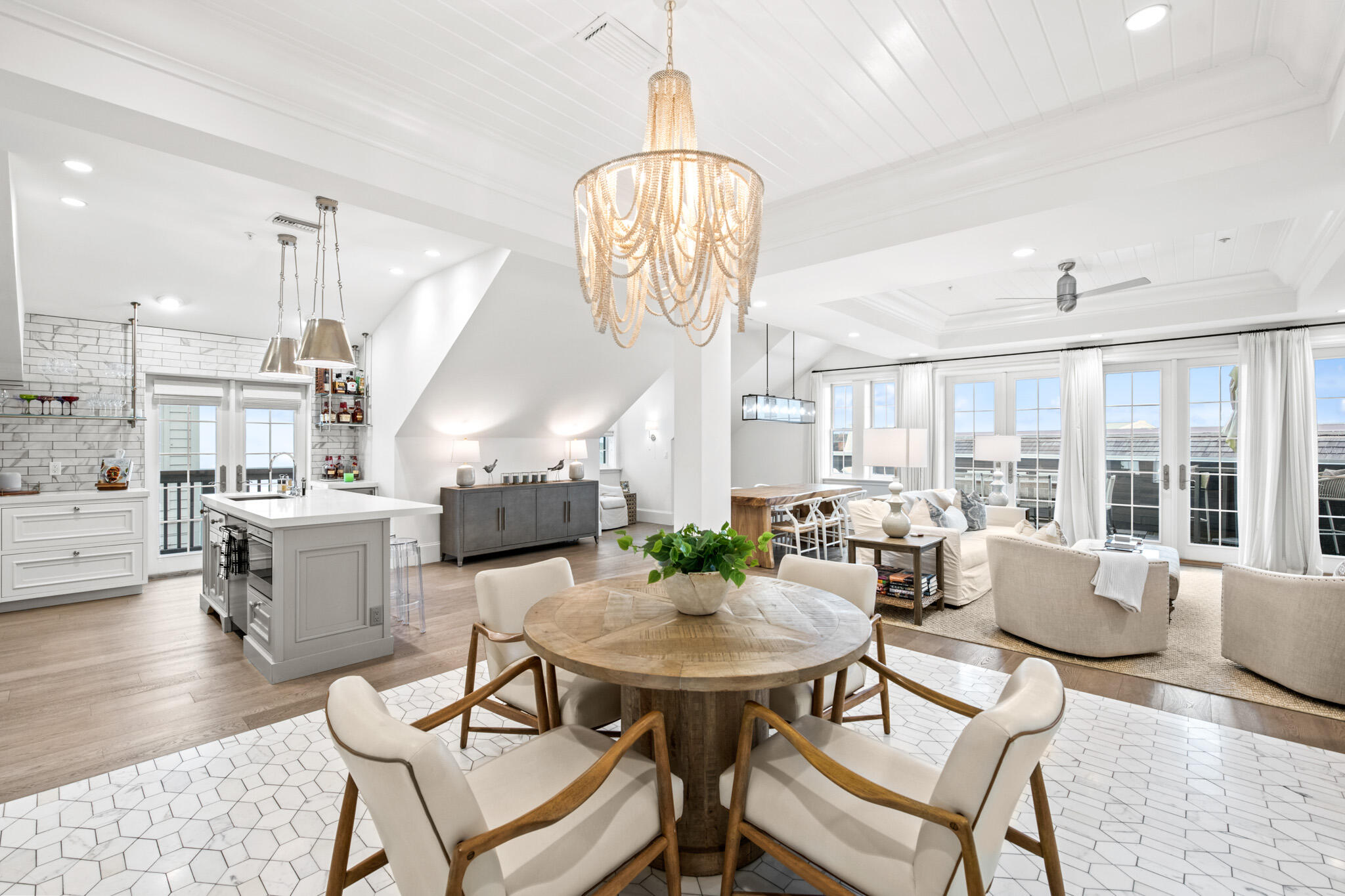 The Orleans, designed by architect Tim McNamara, is situated in the heart of Rosemary Beach, adjacent to the infamous town Hall, and steps from the sugar-white sand beaches of the Gulf. This 4th floor penthouse unit seamlessly blends modern coastal elegance with old world charm. Emerse yourself in the action while also feeling a sense of privacy and seclusion. The Orleans, designed by architect Tim McNamara, is situated in the heart of Rosemary Beach, adjacent to the infamous town Hall, and steps from the sugar-white sand beaches of the Gulf. This 4th floor penthouse unit seamlessly blends modern coastal elegance with old world charm. Emerse yourself in the action while also feeling a sense of privacy and seclusion. 

Easily entertain guests with generous open living, dining, and kitchen which opens out to an oversized balcony with breathtaking views of the Gulf. 

The bright modern kitchen is equipped with Wolf range/hood, Sub Zero refrigerator, quartz countertops and outfitted in custom open shelving made by Amuneal 

The large master suite features a walk-in closet, private balcony and en suite bath boasting a separate tiled shower and luxurious soaking tub. 

A second suite is located just down the hall with a private bathroom and balcony plus a separate space for bunks in the hall way to accompany the third bathroom. 

This penthouse unit is a must see!