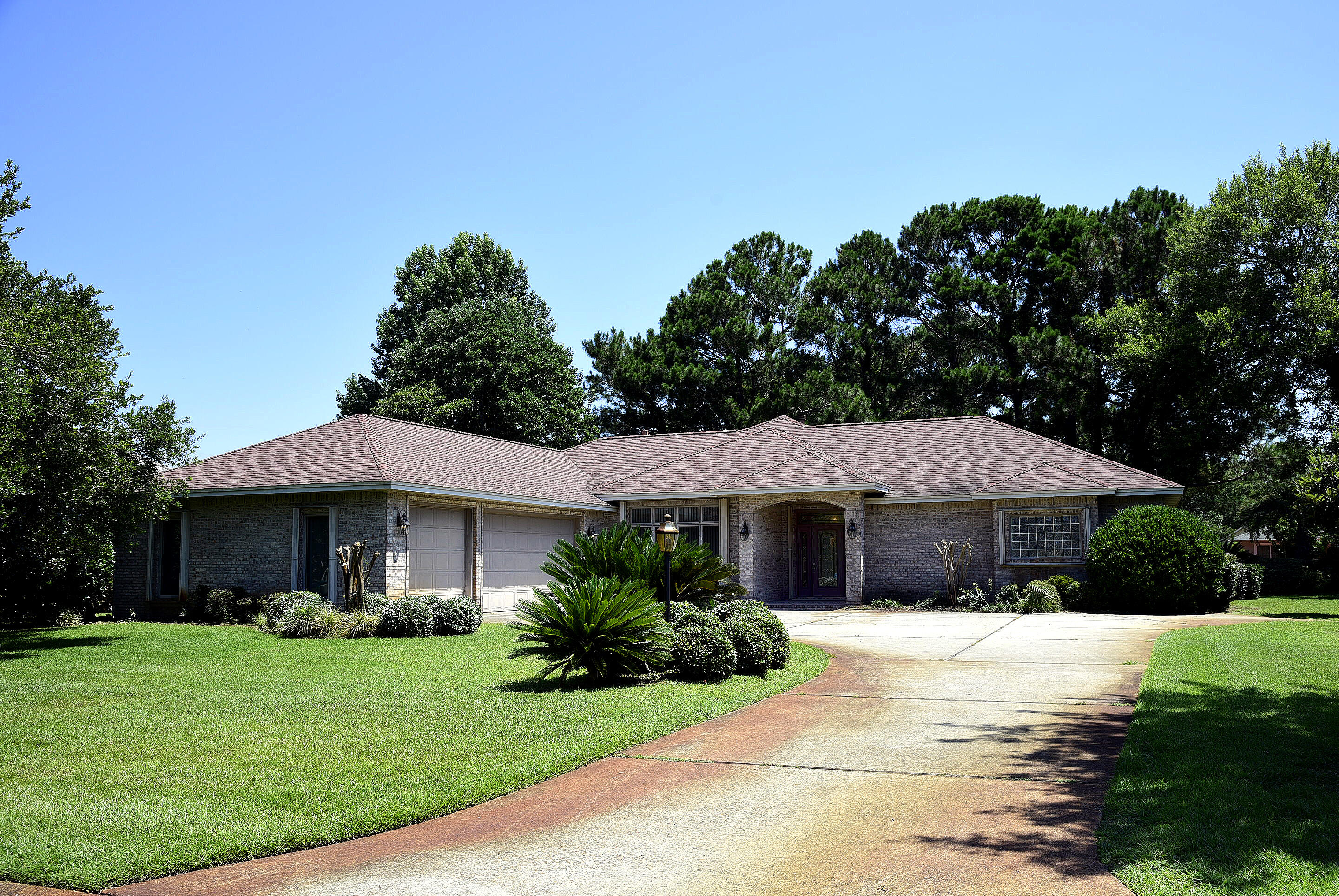 Welcome to 1511 Glenlake Circle in  beautiful Bluewater Bay. This charming 3-bedroom, 2-bathroom house offers a light and bright atmosphere, perfect for those who enjoy natural sunlight. The house features a covered patio where you can relax and enjoy the serene view overlooking the lake. Located in a peaceful neighborhood, this home provides a tranquil setting for you to unwind and enjoy the beauty of nature. Don't miss out on the opportunity to make this lovely house your new home. Contact us today to schedule a viewing!