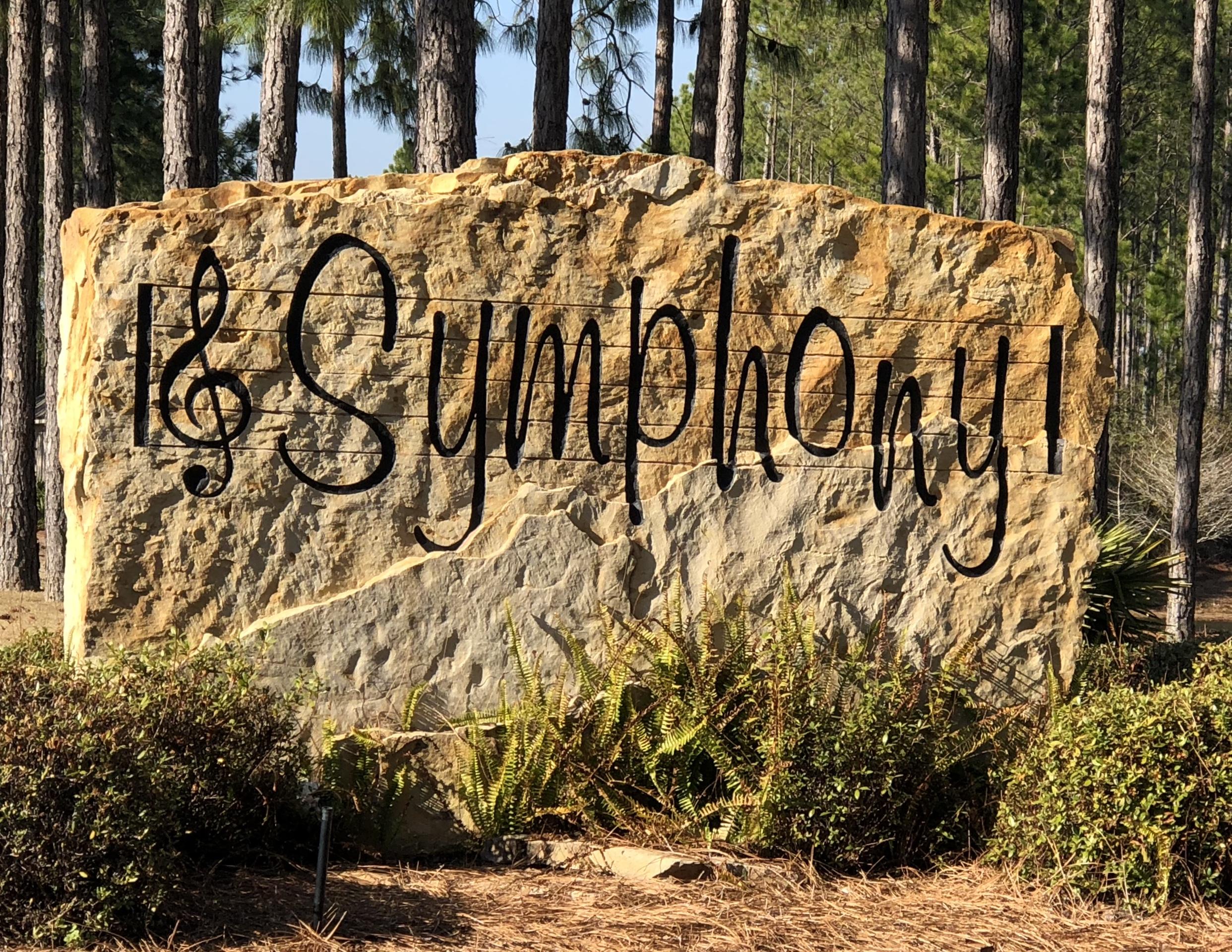 This lot is nestled on a Nature Conservation Easement, means no one can build behind you. This lot can easily accommodate any sizable home. Located in an established community with only a few lots left to build on. Owners at Hammock Bay enjoy a 6,000 sq.ft.clubhouse with Meeting rooms, 4,000 sq.ft.fitness center ,pet park, many nature/walking trails, competition lap pool, resort-style pool, putting green, movie theater, extensive playground, tennis courts and basketball courts. Within 15 minutes to the beaches, shopping & entertainment of the Emerald Coast! A must see to what this beautiful home site has to offer. Buyer to verify square footage, dimensions, HOA Fees & Dues.