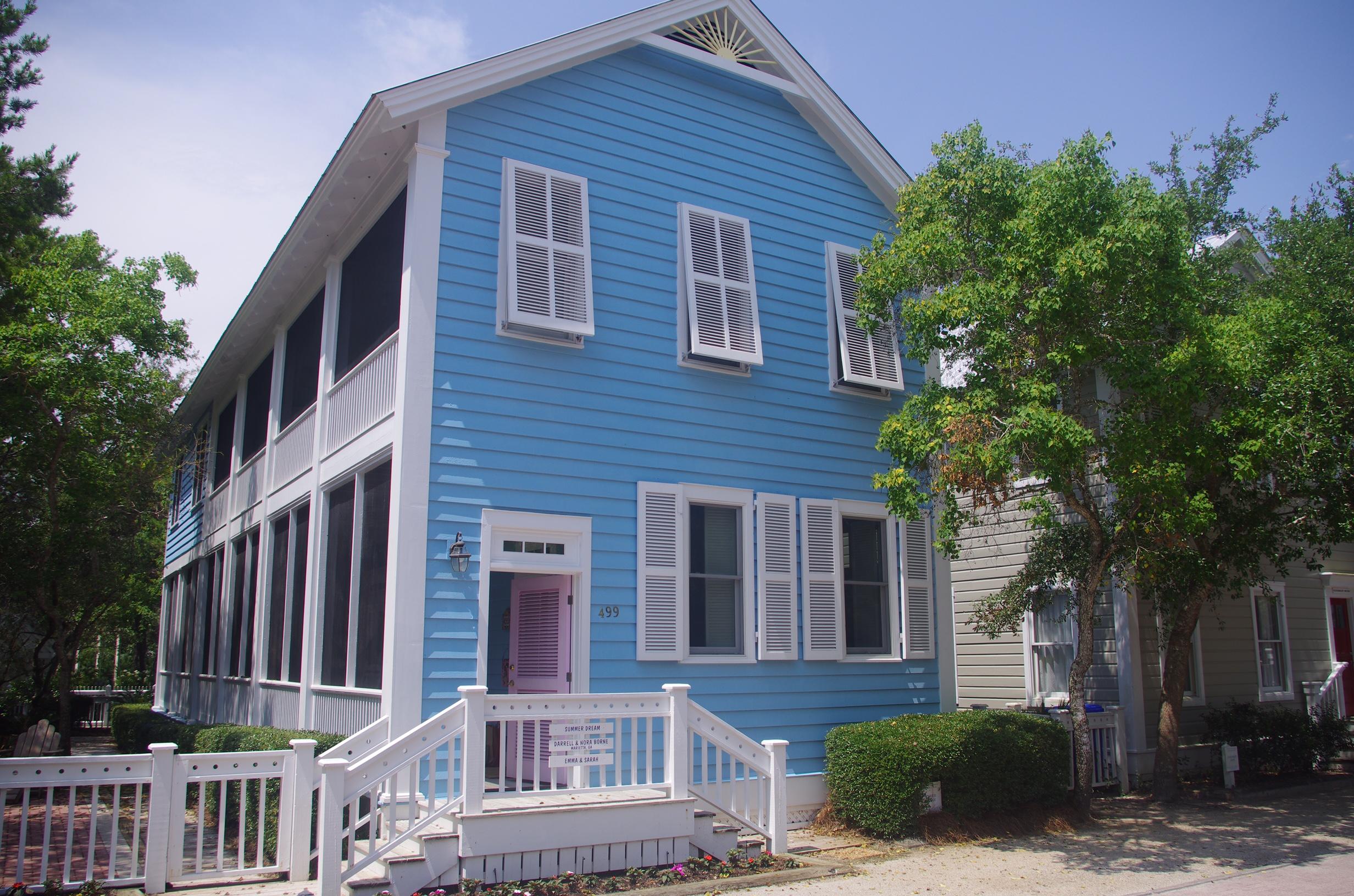 This light filled, spacious cottage is a family dream house. Built in the classic Seaside style and located close to pool, play ground and fitness center. The house speaks comfort and easy living. A wall of French doors opens the capacious main floor living area onto a screened porch that runs the full length and wraps around the house. The 30' x15' living and dining room features 10' ceilings, beadboard walls and a fireplace surrounded with book cases. The mix of antique and beach chic furnishings complement each other. Crown molding and oak floors used throughout the house. The kitchen has a pass though to the dining room and includes black and white tile floors, granite countertops and stainless steel appliances. Half bath and laundry room also on first level. Upstairs, the master suite opens onto the second level screened porch. Spacious master bath with double vanities. Two guest bedrooms with Jack & Jill bath also open onto the screened porch. Host your family picnics or barbecue on the brick paved patio under the shade of the oak trees. Private enclosed outside shower. This beach house is ready to make your dreams come true.