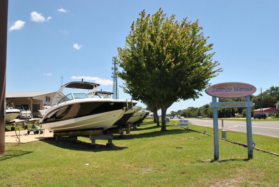 Incredible investment opportunity at 8% CAP rate! The property is the showroom/warehouse facility of Sunrise Marine boat dealership. It is under a long-term NNN lease with a national company that owns and operates top marine dealerships across North America (it acquired Sunrise Marine in 2016). Two parcels are included in sale totaling 3.7 acres with approximately 535 ft of Hwy 98 frontage. The showroom, office, and warehouse building is 9245 sqft. There is also an income producing billboard on the property. Total NOI is $216,000. The property was appraised for $2.7 million in June, 2016.