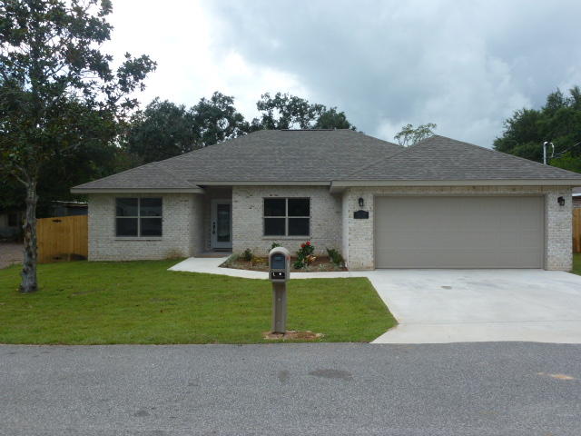 HEAR YE, HEAR YE,SELLER WILL ASSISTS WITH CLOSING COST. Ready for Move-In!! YES,THIS STAR QUALITY, CUSTOM BUILT, ALL BRICK, SPLIT FLOOR PLAN,4 BEDROOM 2 BATH HOME,IS COMPLETE WITH AN ARRAY OF SPECIAL FEATURES ONE WOULD HOPE FOR. NINE FOOT LACE TEXTURED CEILINGS ACCENTED W/CROWN MODING IN TREY CEILING LIVING/GREAT ROOM/DINING AREAS. BEAUTIFUL 48''in. WOOD DESIGN PLANK TILE FLOORING IN FAMILY GREAT ROOM, KITCHEN/DINING AREA AND ALL WET AREAS WITH WALL-TO-WALL CARPET IN ALL BEDROOMS..HIGH BASE BOARDS, FINISHED BULL NOSE CORNERS, AND CEILING FANS IN EVERY ROOM. FULLY LOADED GALLEY KITCHEN IS EQUIPPED WITH STAINLESS STEEL APPLIANCES,CUSTOM BUILT CABINETS AND GRANITE COUNTER TOPS. HOP-UP BREAKFAST BAR ADDS THAT SPECIAL TOUCH WHICH OFF SETS DINING AREA/BREAKFAST NOOK AND KITCHEN.  MASTER BEDROOM SUITE WITH ...TREY CEILING OFFER TRANQUIL OASIS WITH A TWO-AT-A-TIME PRIVACY BATHROOM DESIGN. CUSTOM MASTER BATH SHOWER, DOUBLE VANITY W/GRANITE COUNTER TOPS, AND LARGE WALK-IN CLOSET. LAUNDRY ROOM LEADS OUT TO FINISHED DOUBLE CAR GARAGE W/GARAGE DOOR OPENER. THE DOUBLE FRENCH DOORS OFF GREAT ROOM LEADS OUT ONTO COVERED PATIO, AND FULLY SOD, PRIVACY FENCED BACK YARD EQUIPPED WITH AUTOMATIC SPRINKLER SYSTEM. LOCATION IS CLOSE TO SHOPPING, THE BEACH, AND ONLY 2.3 MILES WEST OF HURLBURT FIELD AFB.THE PRICE IS RIGHT!  WORTH SEEING, AND WELL WORTH OWNING!