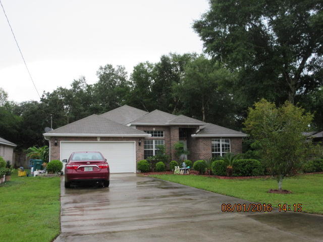 Beautiful brick home in Shalimar. No carpet in home. Easy maintenance laminate wood floor covering. Tile in kitchen. Enjoy the easy care lot and enjoy the huge screen porch overlooking lush plants. Plenty of space to entertain and enjoy!!! You won't want to miss this beauty!!!! Washer/Dryer not warranted.
