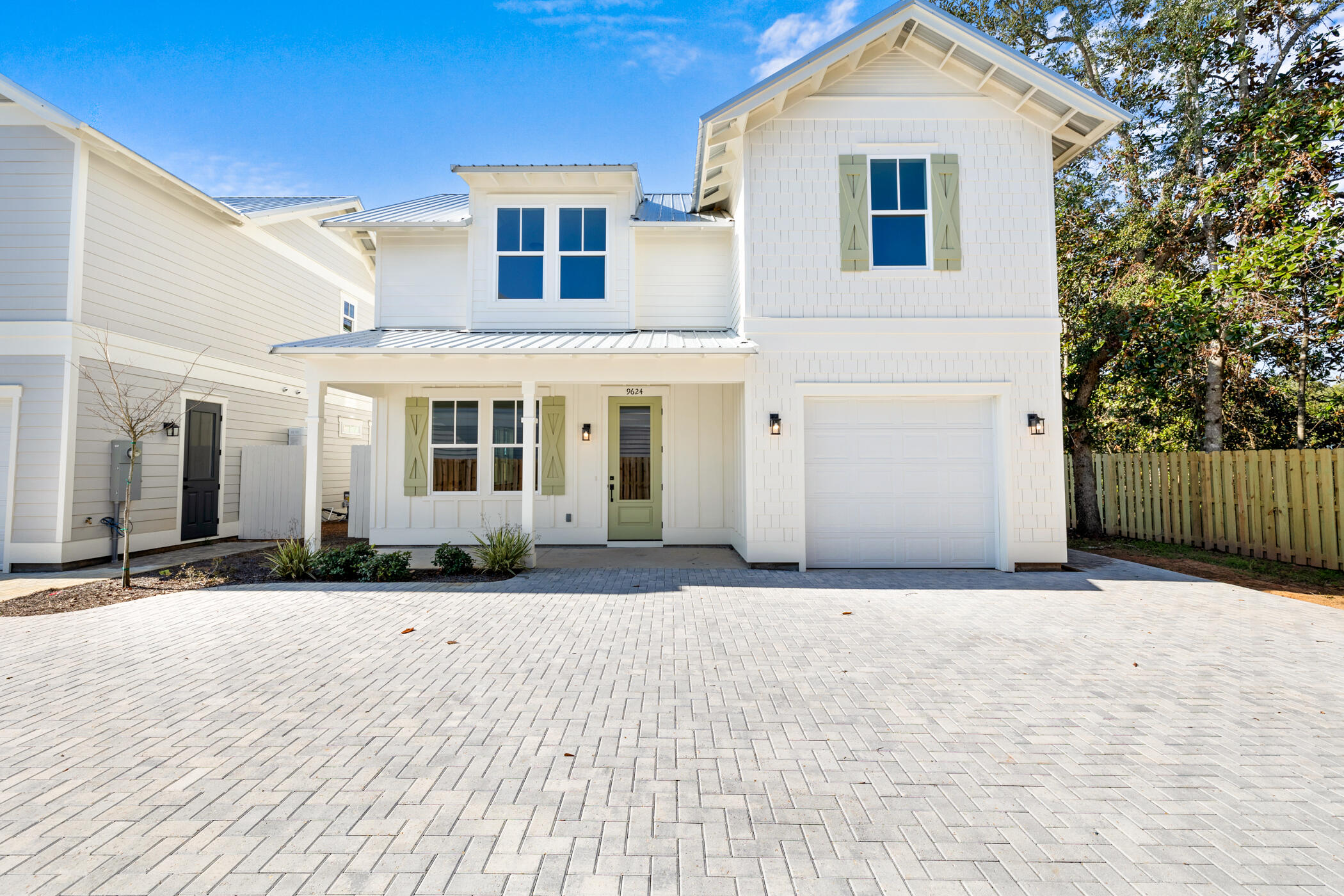 Completed construction with Seller Financing available with competitive terms!! Welcome to your dream oasis, where everyday feels like a vacation and everything you need is right in this location. Nestled in an exclusive, newly developed waterfront community, this 4-bedroom, 4.5-bath home (with bonus area) offers the perfect blend of luxury, tranquility, and modern convenience. Imagine waking up to serene water views (from your first floor primary suite), enjoying your morning coffee while watching the gentle ripples of the Santa Rosa Sound, and stepping out onto the community dock to hop on your boat for a quick cruise or sunset sail. With 9 private slips just steps from your door, boating enthusiasts will find paradise at their fingertips. This is more than just a home, it's a lifestyle. Spend your days lounging by the water, walking along our pristine beaches just minutes away, or exploring all Navarre's growth has to offer. Live where others dream of vacationing, an angler's paradise, water sports haven, and a sun lover's refuge. Welcome to your forever home, where the sky meets the sea, and every day is an opportunity to indulge in the ultimate coastal lifestyle alongside your modern everyday needs.

Prices, plans, features and options are subject to change. (New homes feature a single sink in upstairs bath just off bonus area). Square footage is approximate. Artist renderings, photos, colors, features and sizes are for illustration purposes only and may vary from the homes as built.