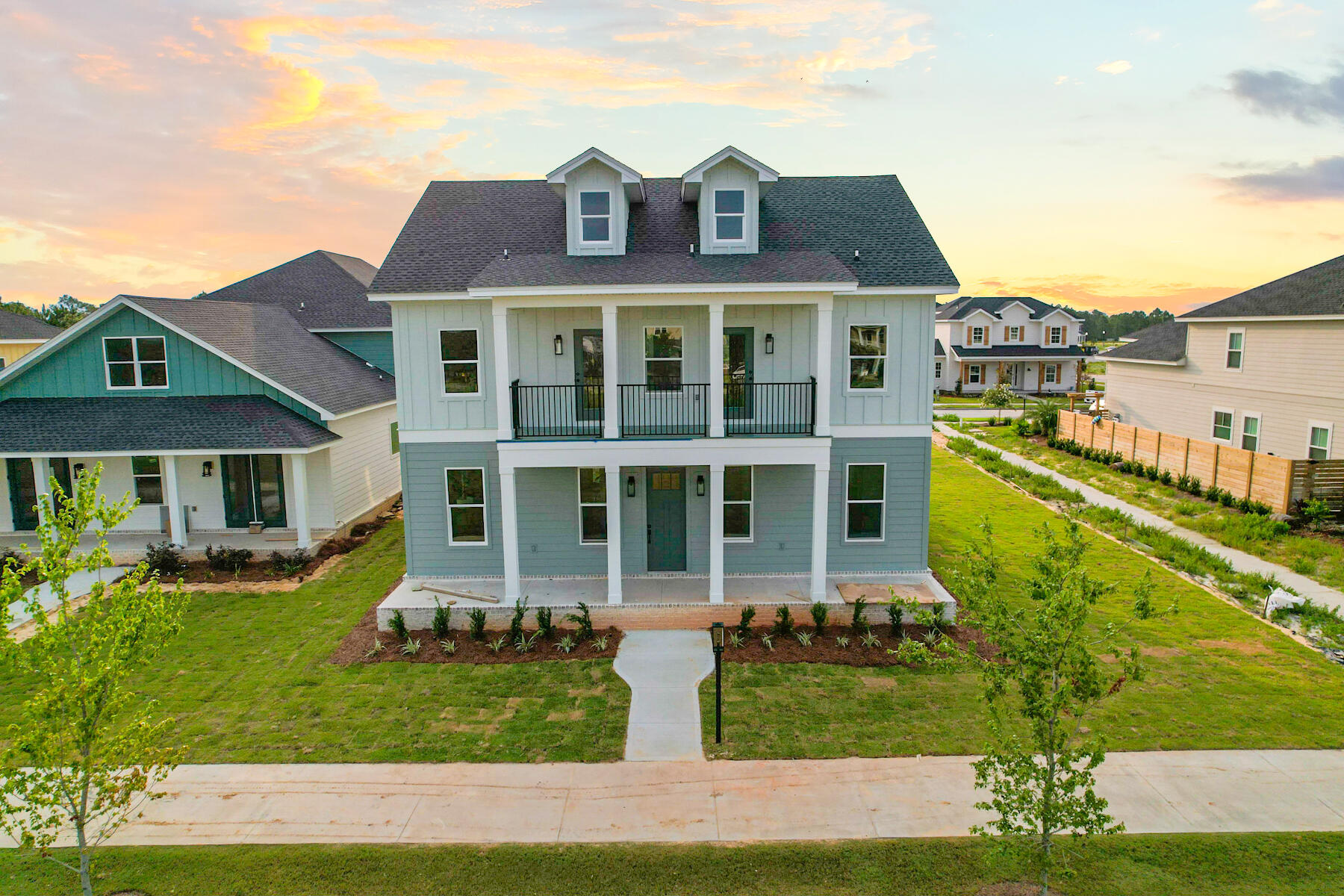 Beautiful 5br, 3.5 ba home in the quaint community of Tapestry Park! Enter through the front door into the open floor plan, The large, open kitchen, with ample counter space, Custom cabinets, Upgraded Lighting, Quartz counter tops, upgraded fixtures & Stainless Steel Appliance package Home has 2 bonus rooms .This home sits on a lot that faces the park. This golf cart friendly community offers wonderful amenities including underground utilities, sidewalks, fabulous clubhouse, community pool, tennis and basketball courts, parks and green spaces, and low HOA fees that include cable, internet, and twice a week trash pick-up. Enjoy sunsets on the front porch of your charming home or take a short golf cart ride down to the beach! It's just that close!!