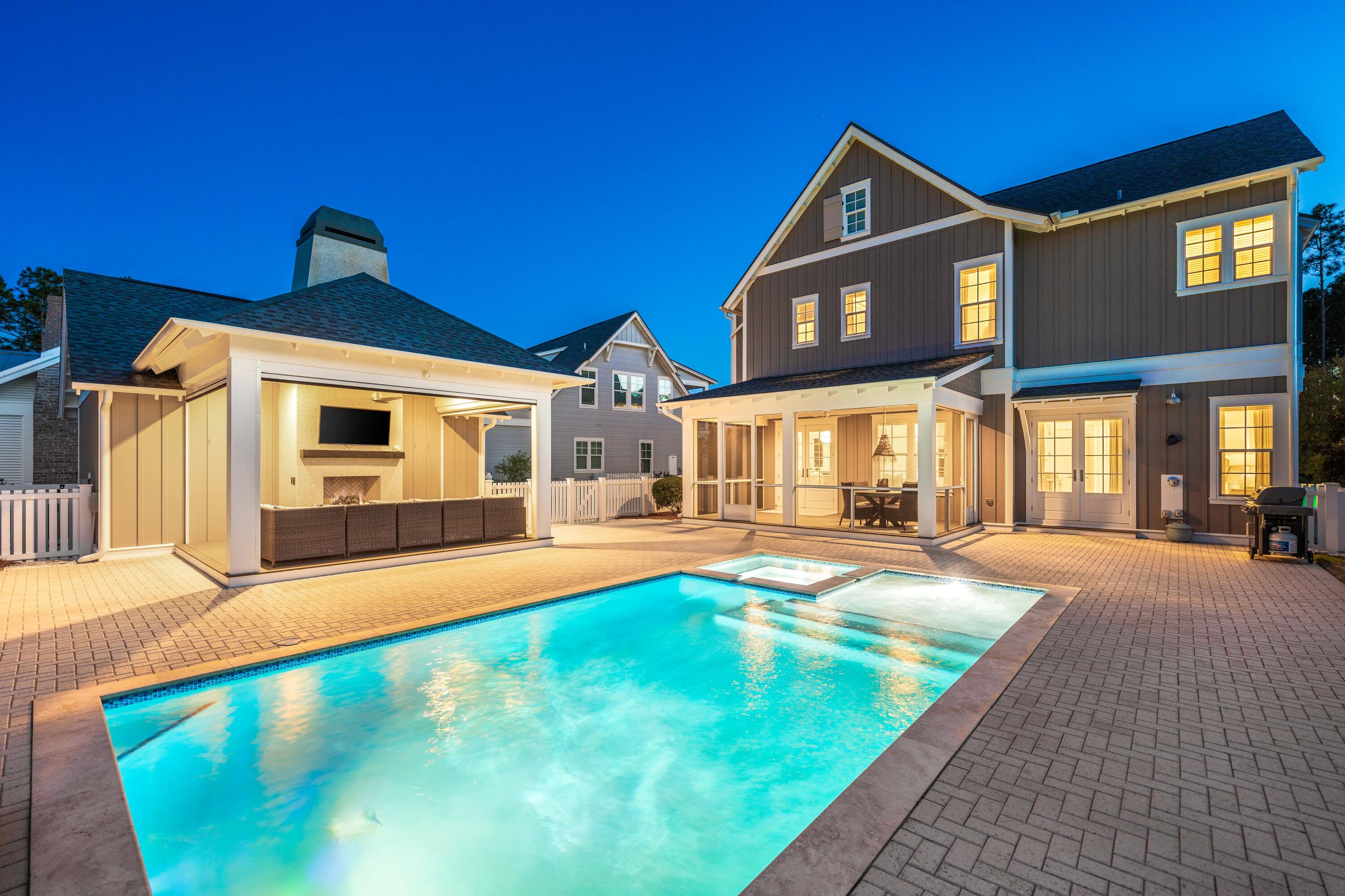 Expansive, private and luxurious WaterSound Origins home located on a pond with a large 27 x 14 Heated Salt Water Pool equipped with hot tub AND a sun shelf. Over $250k in upgrades throughout this meticulously maintained home! Offered Fully Furnished, just 1 owner, used as a 2nd home, this is practically brand new! Upgrades and features include but are not limited to; Whole Home Generac Generator, Cabana with Motorized Screens and Gas Fireplace with Cannonballs, New HVAC System, Newly Painted Exterior, Culligan Whole Home Water Softener, Gutters Throughout the Home and Garage, Additional Pavers around back of Garage, Epoxy Garage Floor and Custom Storage Cabinets, Motorized Solar Shades, Thermador Range, Dishwasher and Vent Hood, Sharp Drawer Microwave, Bosch Fridge, Quartz Countertops throughout, 10 Foot Ceilings throughout, Grohe Fixtures throughout the home...the list goes on! Upon entry to the home you have the Professionally designed Laundry and Powder Room to your left and right. The home opens up in to a well laid out open floor plan with the kitchen living and dining areas blended together all overlooking the pool and outdoor area of the home. The Primary Bedroom is on the main level of the home and boasts direct, private access to the pool deck, with a large walk-in closet, ensuite bath featuring dual vanities, garden tub and a luxurious shower. Upstairs you have the remaining 4 bedrooms each facing the 4 cardinal directions, offering a unique perspective and experience. The South and West Guest Bedrooms each have their own private ensuite baths, while the North and East bedroom share a Jack and Jill bath. All the bedrooms are centered around the loft area and Southern Porch, with custom porch swing bed, perfect for watching the sun set over your little piece of paradise on the Emerald Coast. 

Offering a lifestyle of both modern convenience and appreciation of the natural environment, the 1,400-acre WaterSound Origins community is located near all the highlights of South Walton including beaches, shopping, and dining. Amenities include the Village Commons with resort style swimming pool, an events lawn, fitness center, and sports courts plus parks, walking trails, and access to Lake Powell with complimentary kayaks for residents' use. Origins Golf Club is a six-hole regulation short course located within the community that also plays as a nine-hole executive course or a 10-hole, par-3 layout. The growing WaterSound Origins town center at the front of the neighborhood includes a Publix grocery store, multiple restaurants, and other services. Owners have the opportunity to join the WaterSound Club with multiple amenities to members including private beach access, beach services, swimming pools, dining, two private golf courses, and the brand-new Lifestyle Center at Camp Creek.