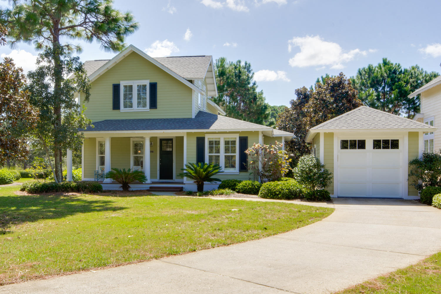 This Laurel Grove home was built on one of the largest lots available with gorgeous views of the lake & 18th fairway of Raven golf course. It features a long driveway with an extended SINGLE CAR GARAGE (deep enough for a golf cart & car). Beautifully designed with a spacious kitchen including an island & breakfast bar, cathedral living room ceiling, granite counters throughout, plantation shutters, hardwood flooring with newer carpet in the bedrooms, and a screened-in porch. Enjoy the master bedroom with guest bedroom on the main floor with an extra bedroom & private bath on the 2nd level. Offered unfurnished with the opportunity to purchase items separately. As an added bonus and to introduce the new owners to the Sandestin lifestyle, the listing brokerage and seller(s) are offering an incentive package to the buyer(s) of this property: Golf for four on one of our three championship courses, a pass for four to Sandestin's exclusive Beach Club, and an introductory membership to the Burnt Pine Golf Club.

Sandestin Golf and Beach Resort is a major destination for all seasons and all ages, and has been named the #1 resort on Florida's Emerald Coast. This magical resort spanning over 2,000 acres is comprised of over 70 unique neighborhoods of condominiums, villas, town homes, and estates. The resort features miles of sandy white beaches and pristine bay front, four championship golf courses, a world-class tennis center with 15 courts, 4 resort swimming pools (and 15 private neighborhood pools), a 113-slip marina, a fully equipped and professionally staffed fitness center and spa, meeting spaces and The Village of Baytowne Wharf, a charming pedestrian village with events, shopping, dining, family entertainment and nightlife. For true golf cart community living, Grand Boulevard is just outside the resort gates and provides access to additional shopping, dining and entertainment â€“ all without traveling on Hwy. 98.  Come to Play, Stay for Life!
